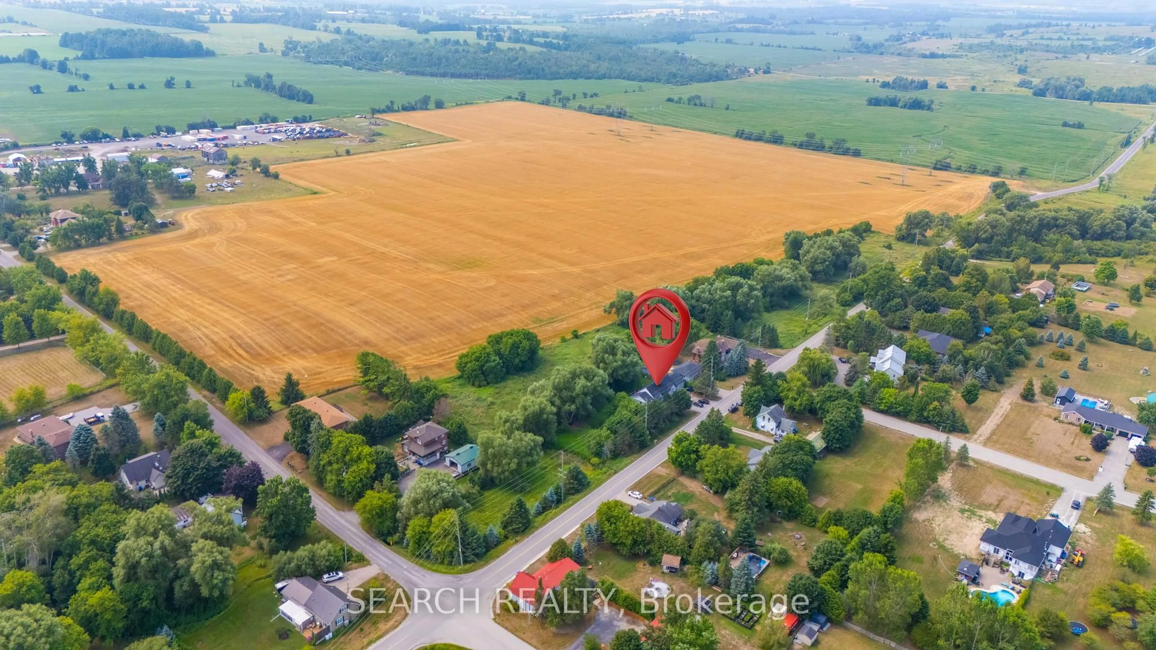 A pic from outside/outdoor area/front of a property/back of a property/a pic from drone, street for 5127 10th Sdrd, Essa Ontario L0L 1N0