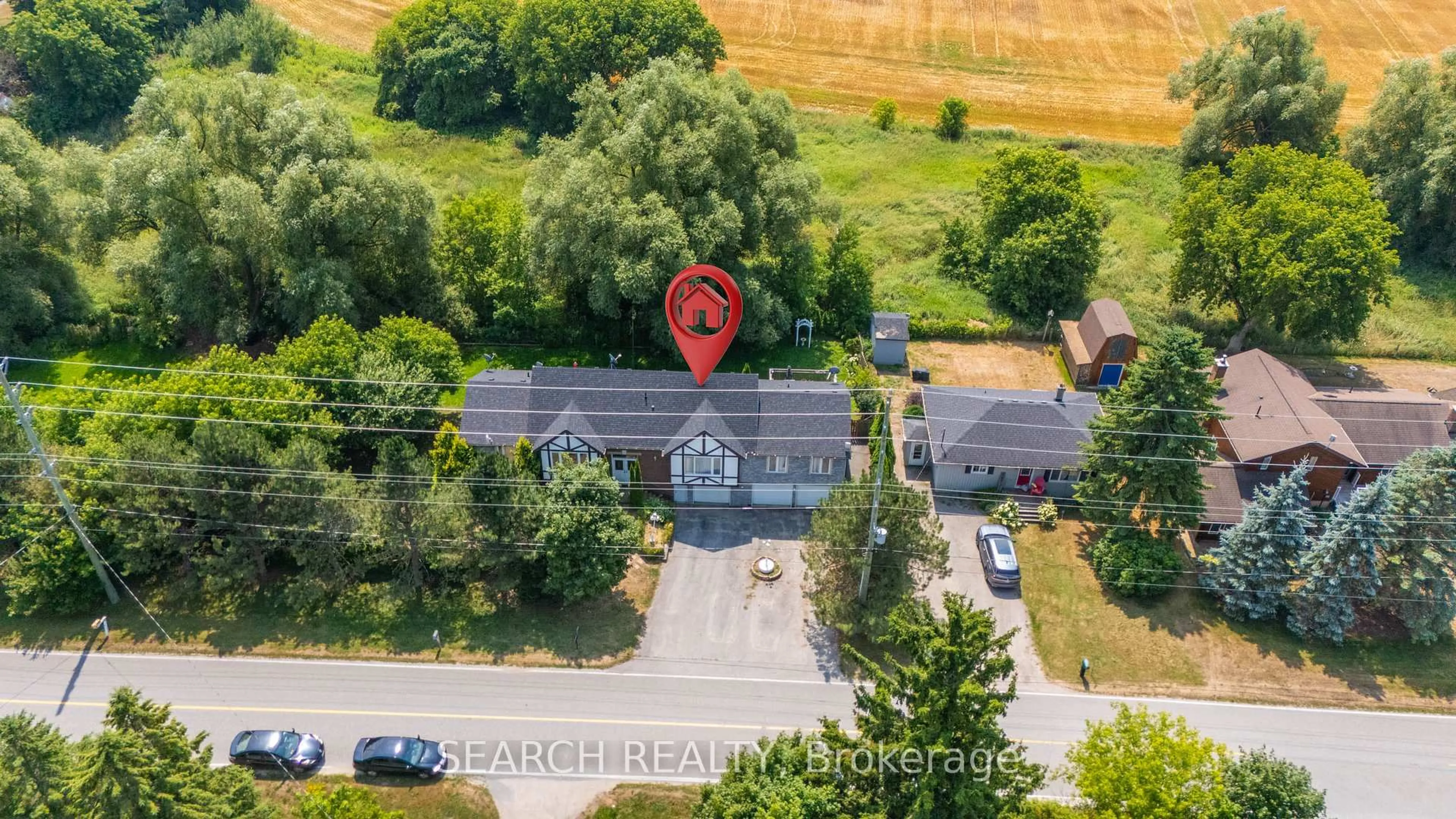 A pic from outside/outdoor area/front of a property/back of a property/a pic from drone, street for 5127 10th Sdrd, Essa Ontario L0L 1N0