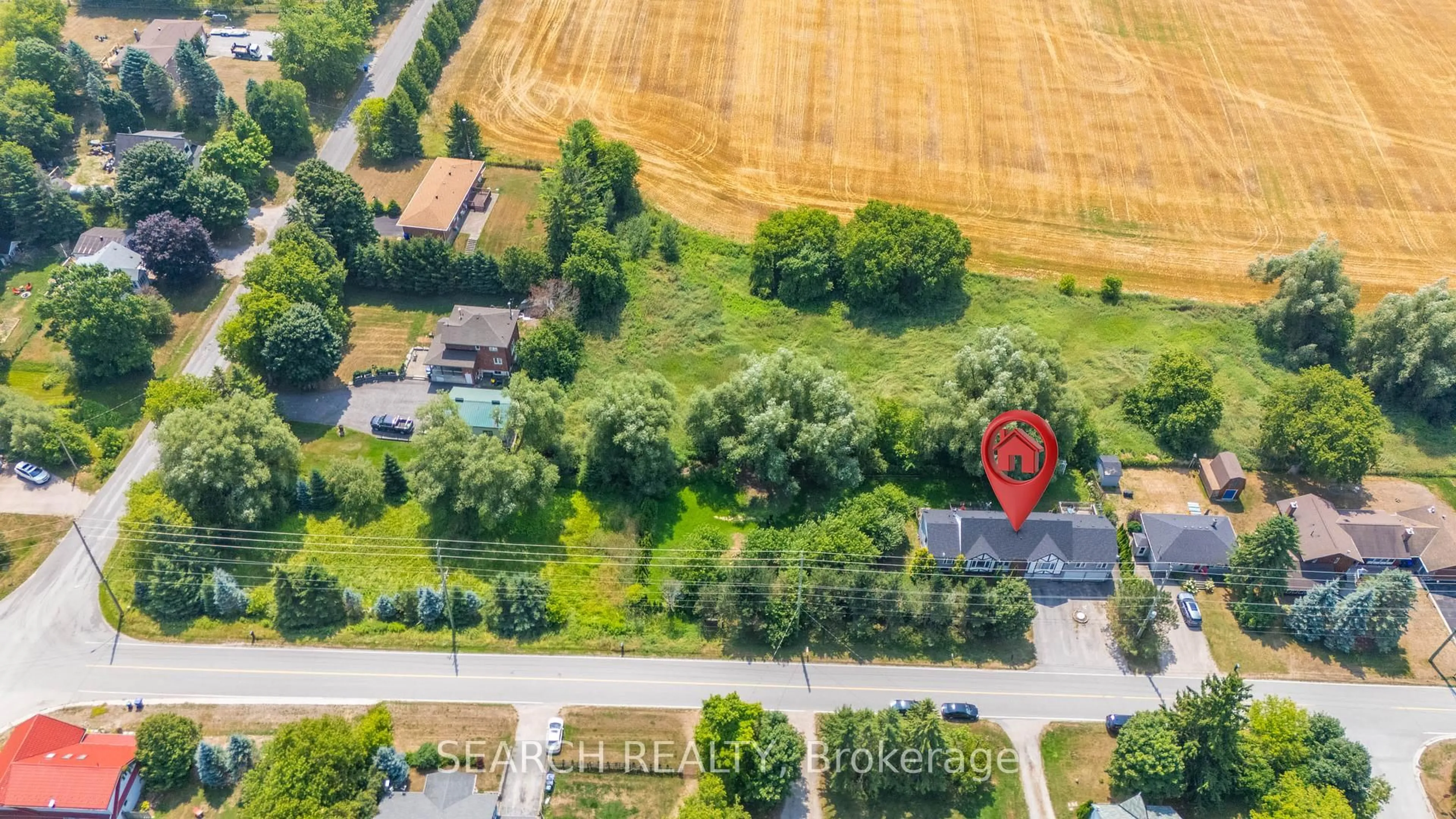 A pic from outside/outdoor area/front of a property/back of a property/a pic from drone, street for 5127 10th Sdrd, Essa Ontario L0L 1N0
