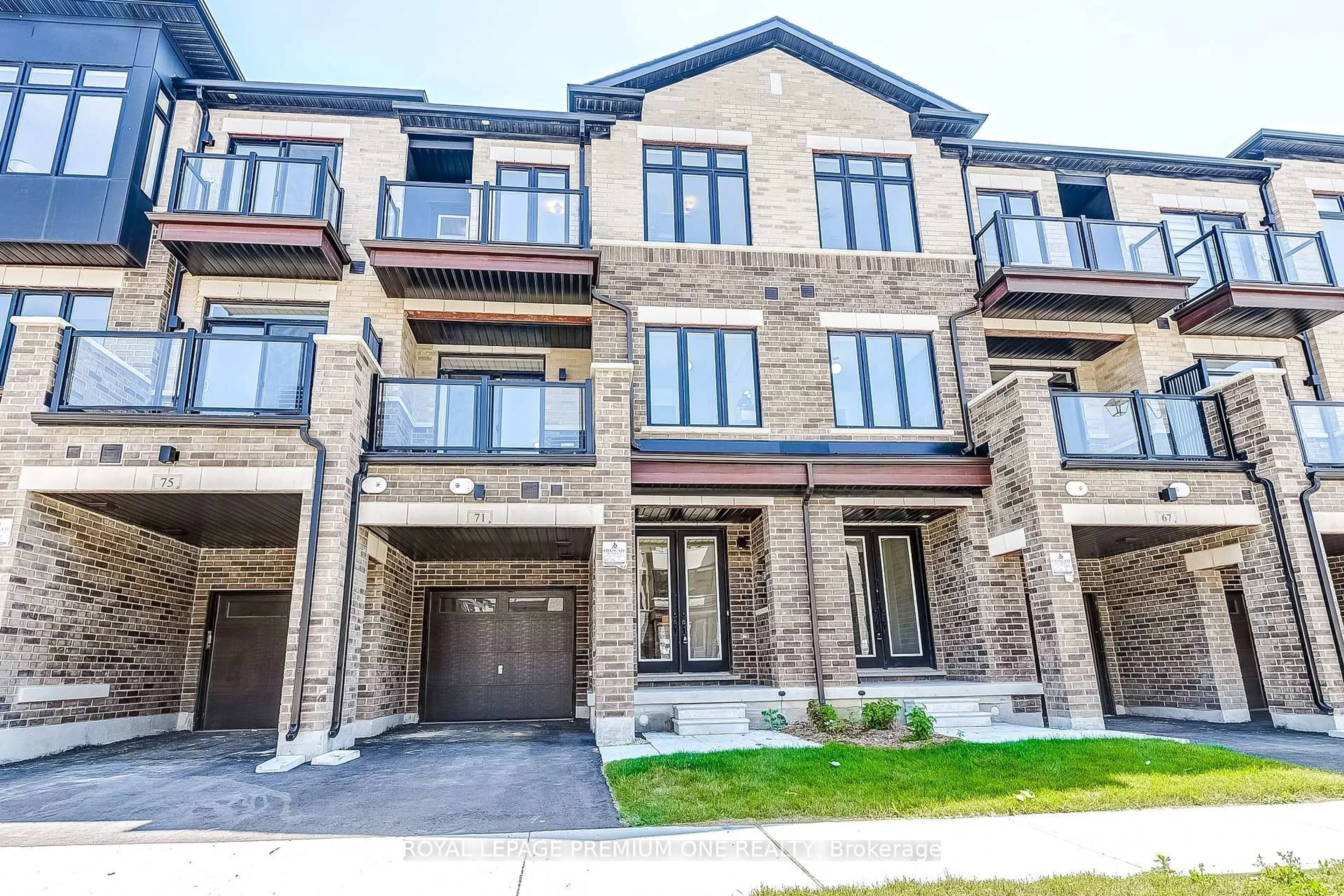 Home with brick exterior material, street for 71 TENNANT Circ, Vaughan Ontario L4H 5L5