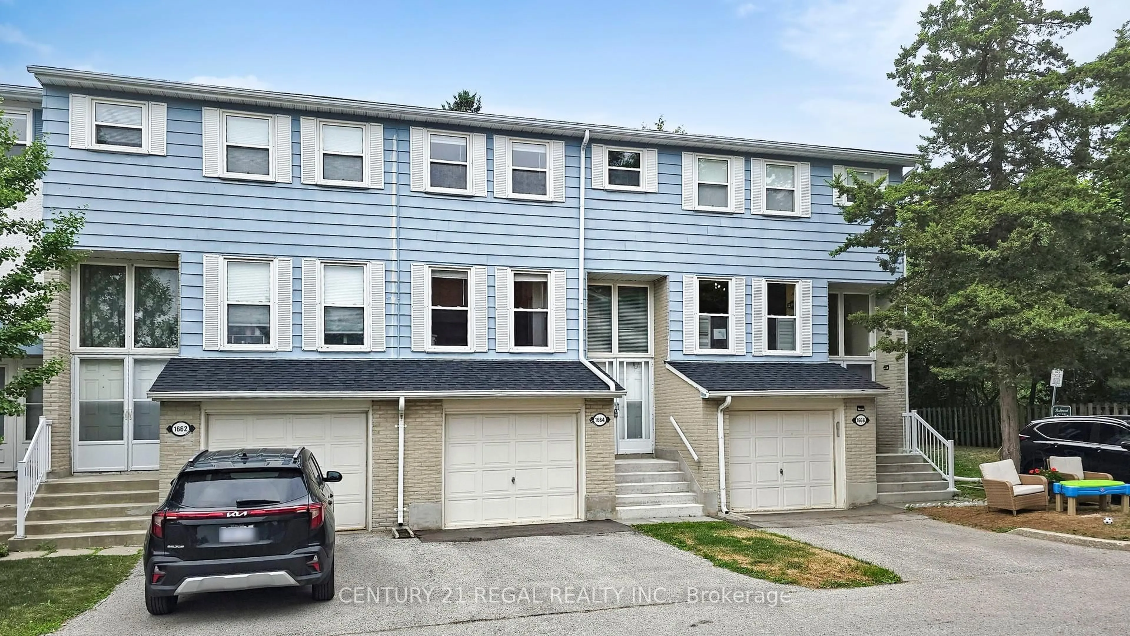 Home with vinyl exterior material, street for 1664 John St, Markham Ontario L3T 1Y9