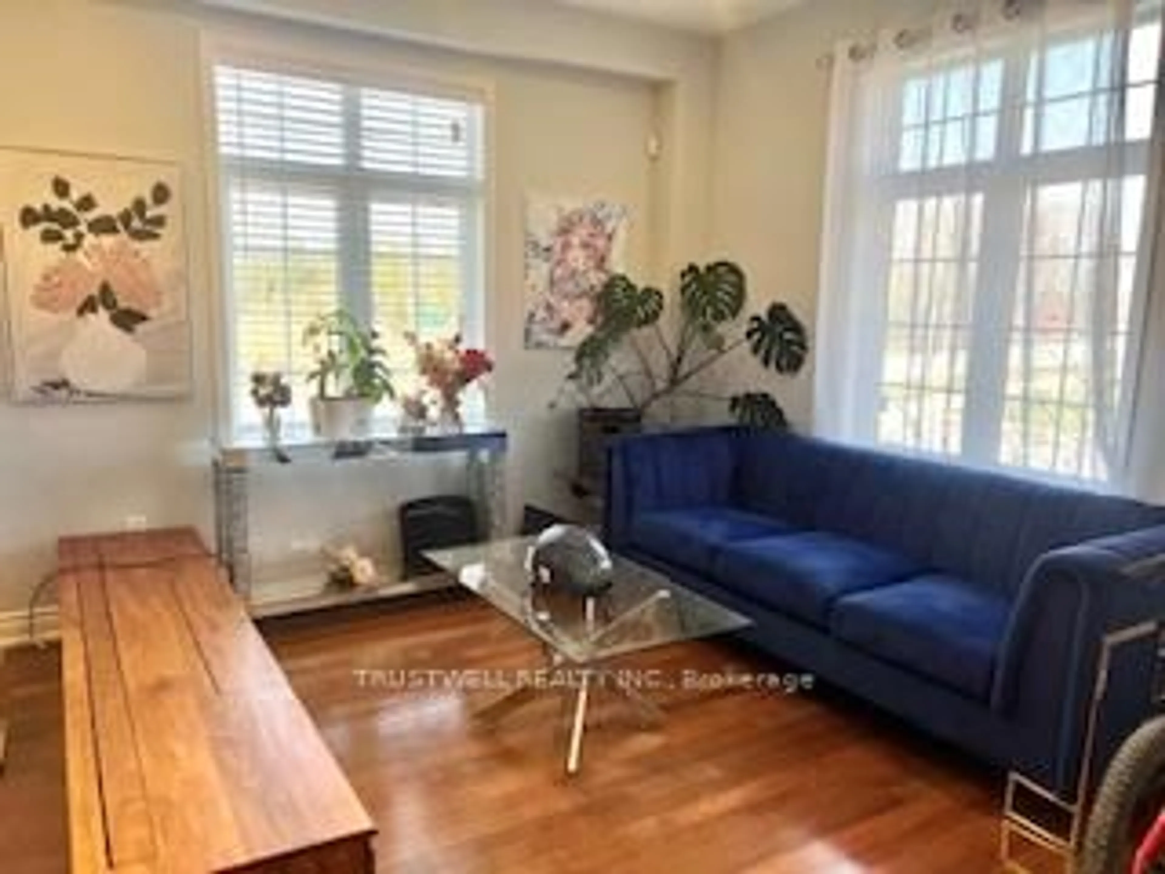 Living room with furniture, wood/laminate floor for 35 Glenbrook Dr, Markham Ontario L6C 2V2