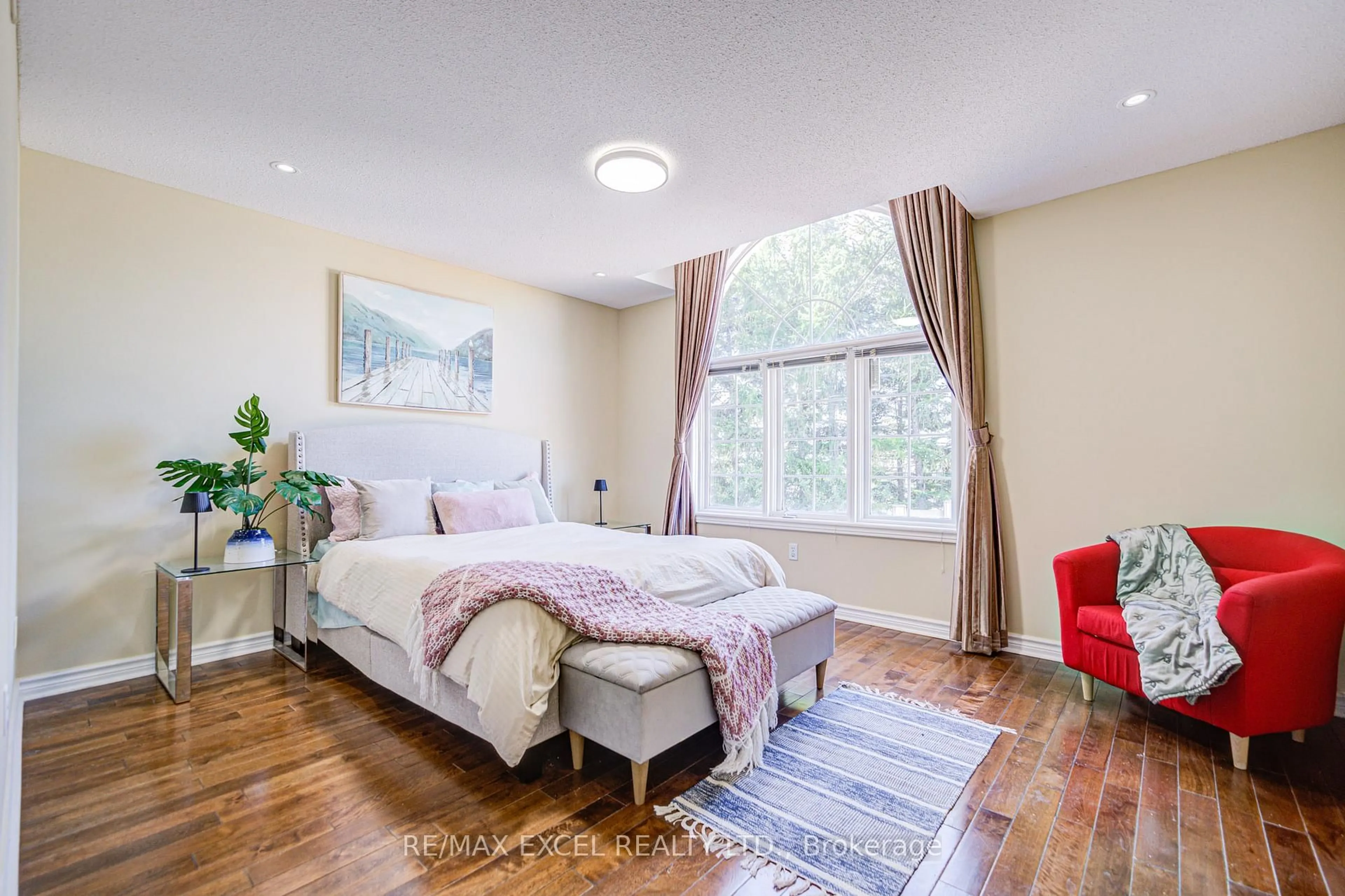 Bedroom with bed, wood/laminate floor for 263 Milliken Meadows Dr, Markham Ontario L3R 0W2