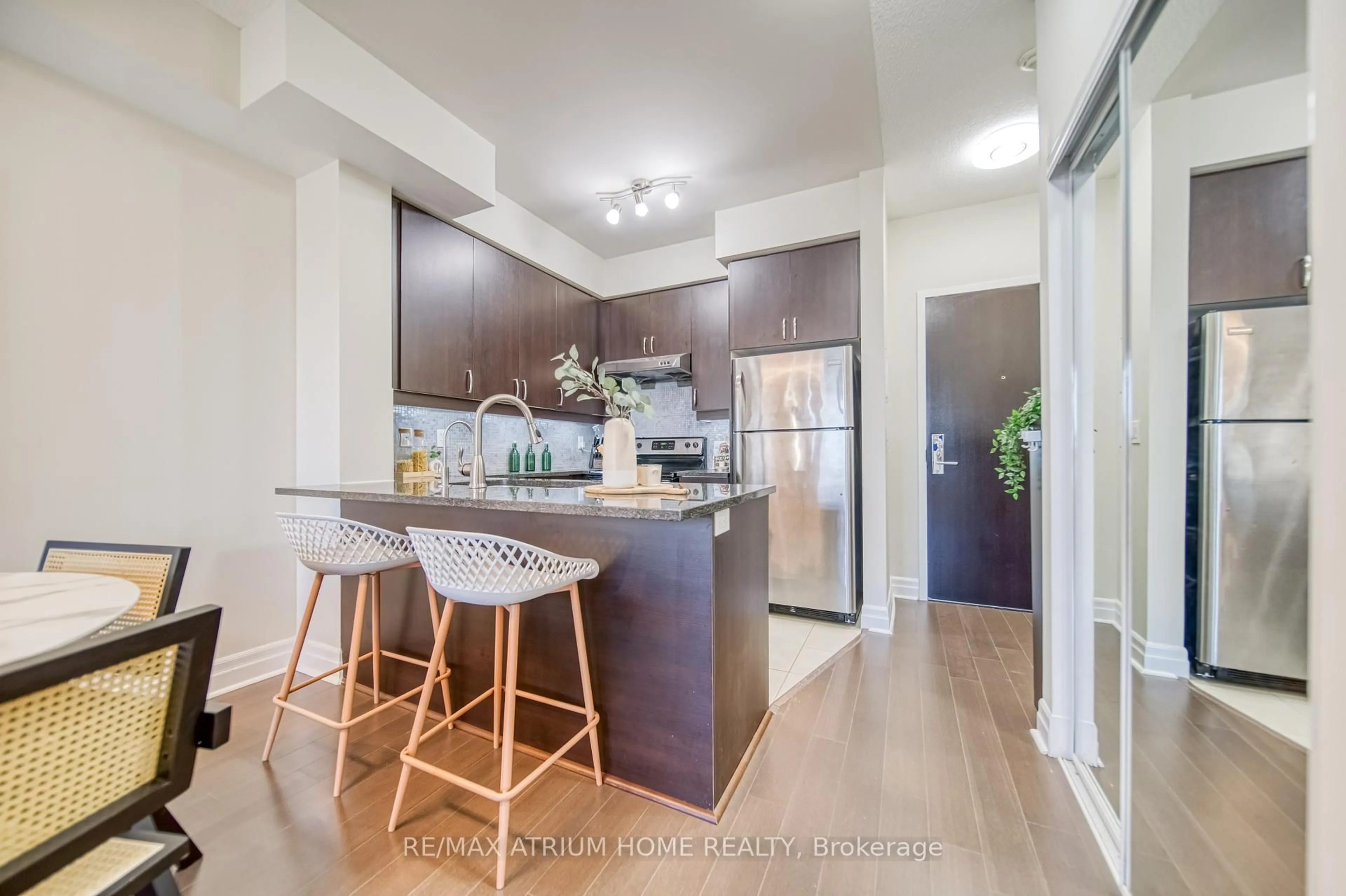 Open concept kitchen, wood/laminate floor for 8110 Birchmount Rd #317, Markham Ontario L6G 0E3