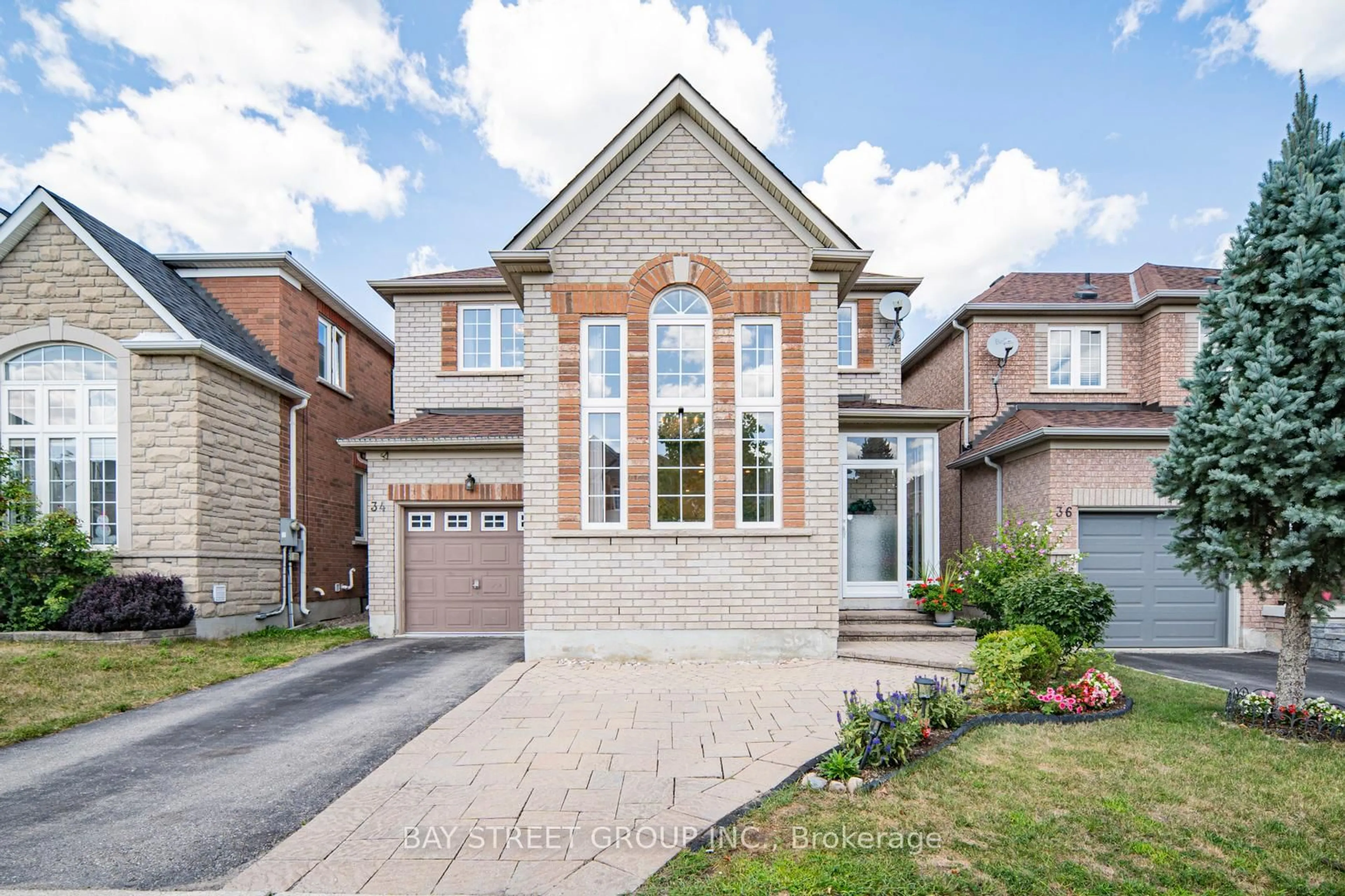 Home with brick exterior material, street for 34 Greengage St, Markham Ontario L6E 1X8