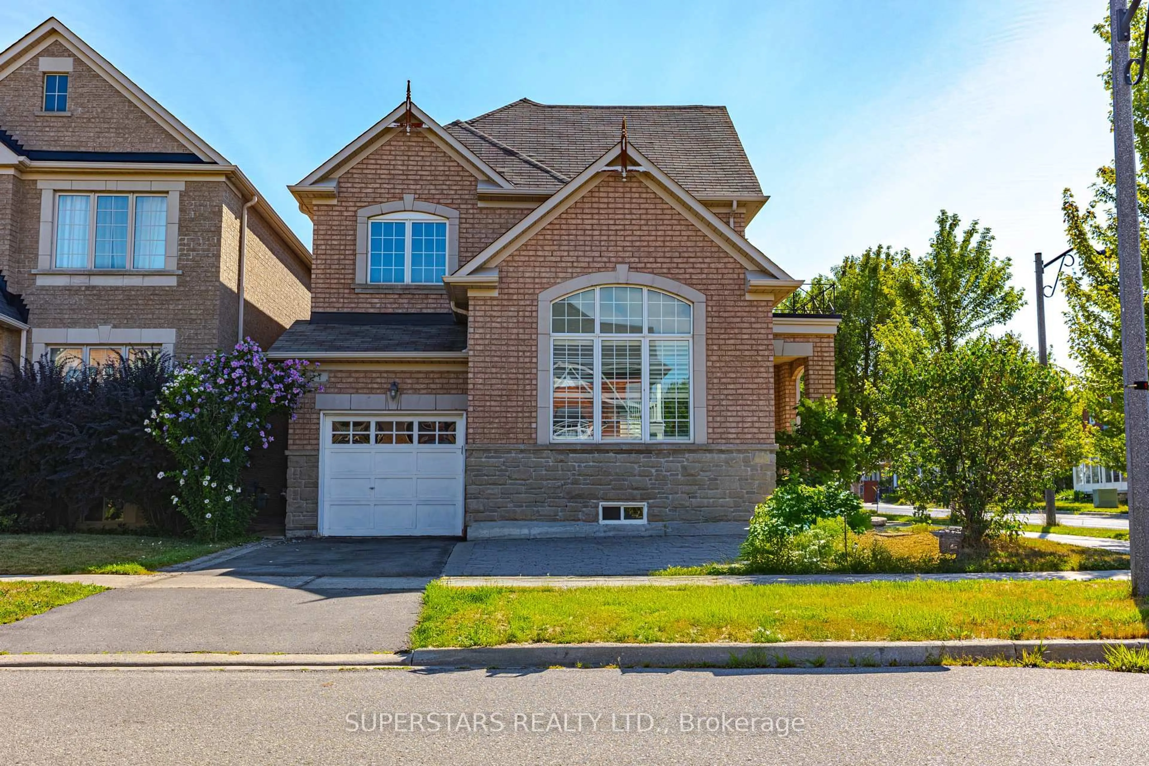 Home with brick exterior material, street for 1 Stoney Creek Dr, Markham Ontario L6E 0H3
