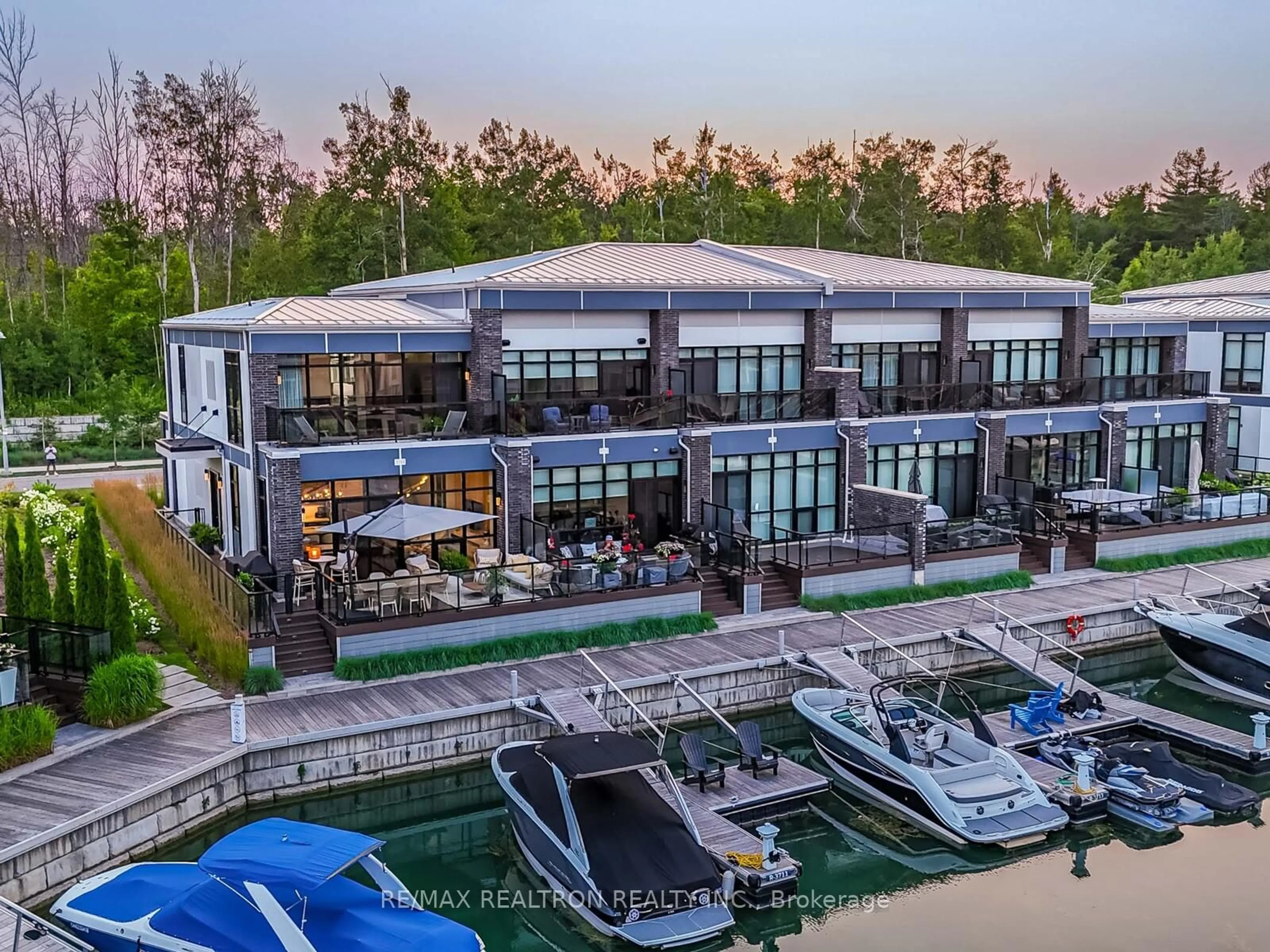 A pic from outside/outdoor area/front of a property/back of a property/a pic from drone, water/lake/river/ocean view for 3711 Riva Ave, Innisfil Ontario L9S 0L5
