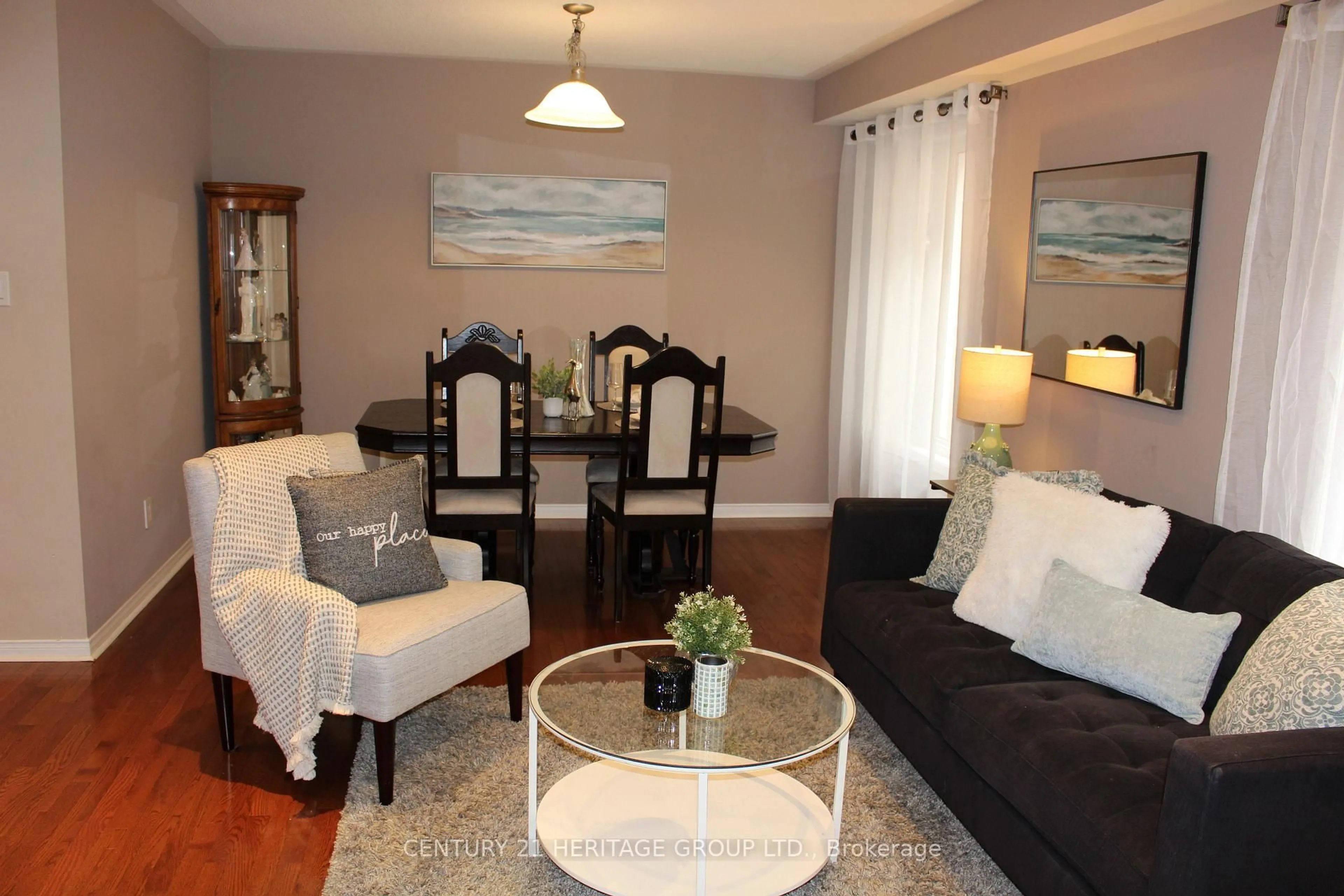 Living room with furniture, wood/laminate floor for 185 River Ridge Blvd, Aurora Ontario L4G 7T7