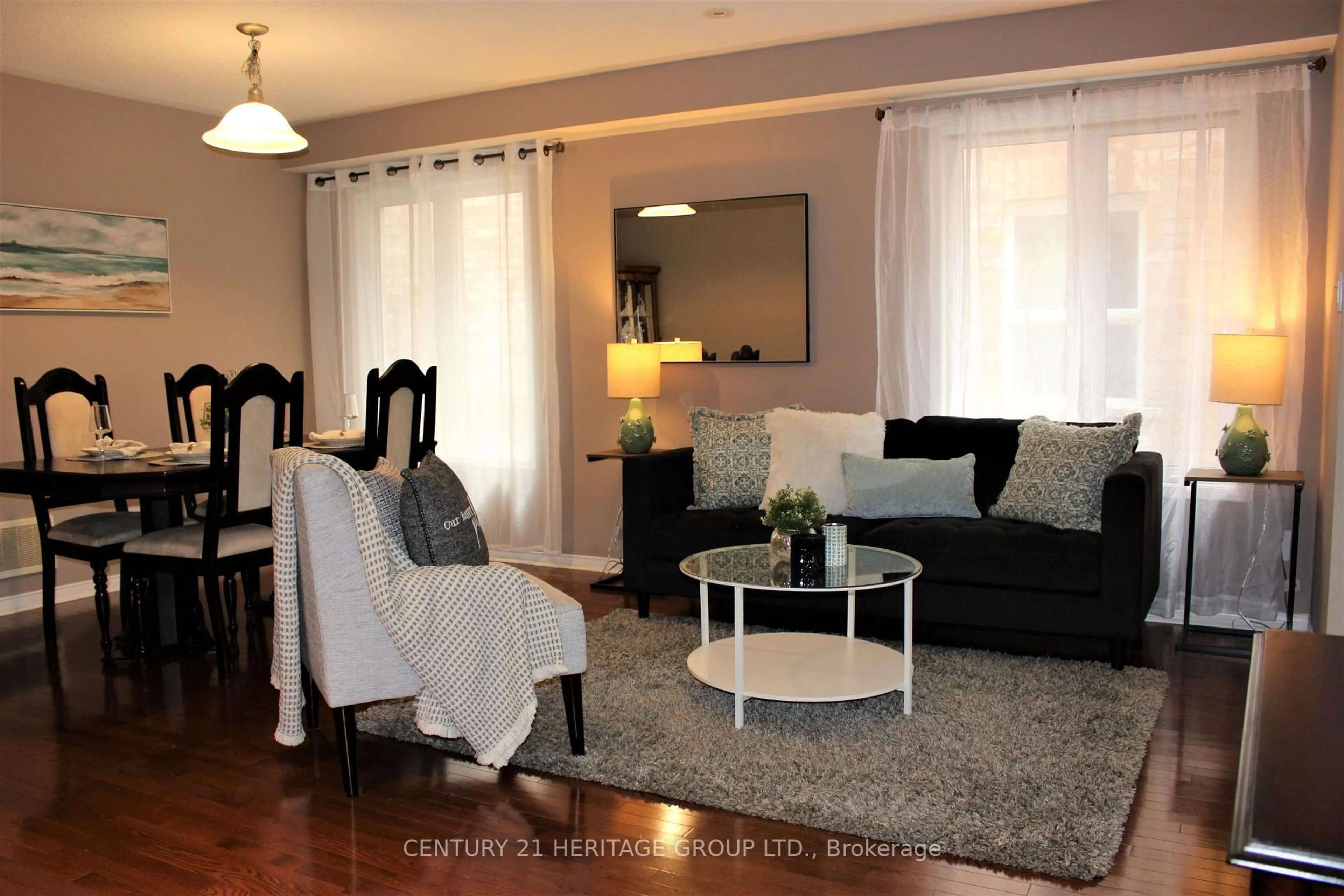 Living room with furniture, wood/laminate floor for 185 River Ridge Blvd, Aurora Ontario L4G 7T7