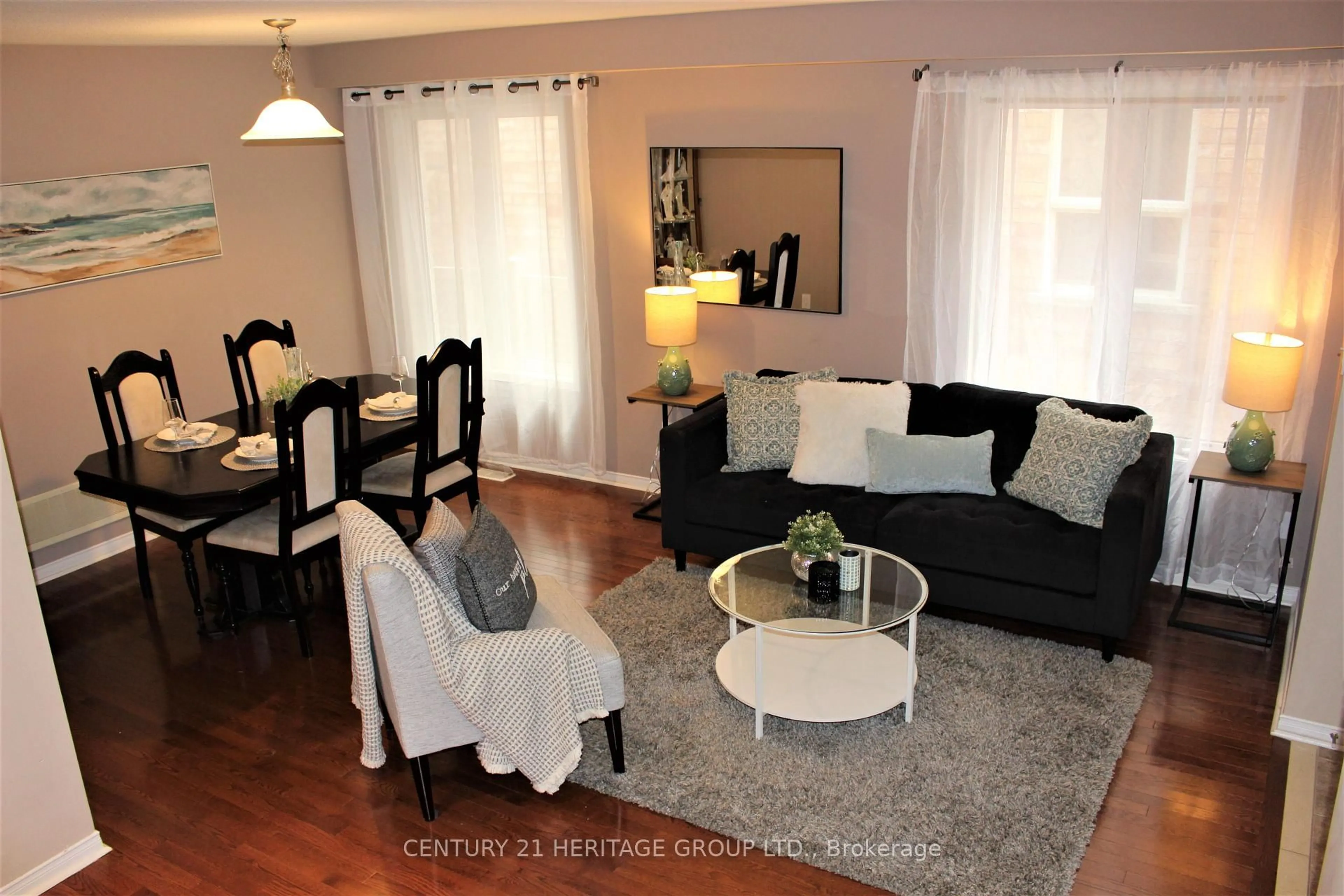 Living room with furniture, wood/laminate floor for 185 River Ridge Blvd, Aurora Ontario L4G 7T7
