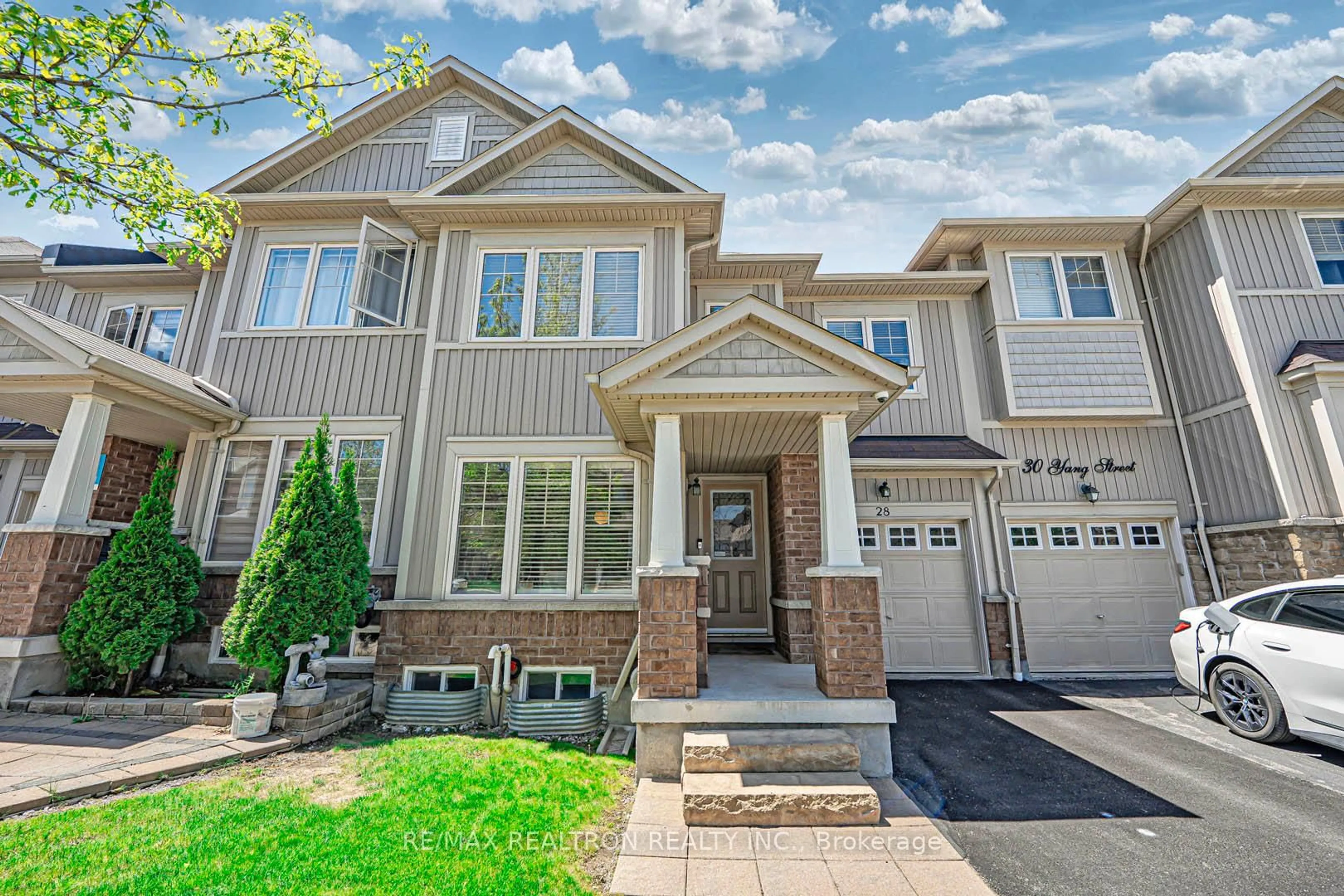 Home with brick exterior material, street for 28 Yang St, Richmond Hill Ontario L4E 0L5