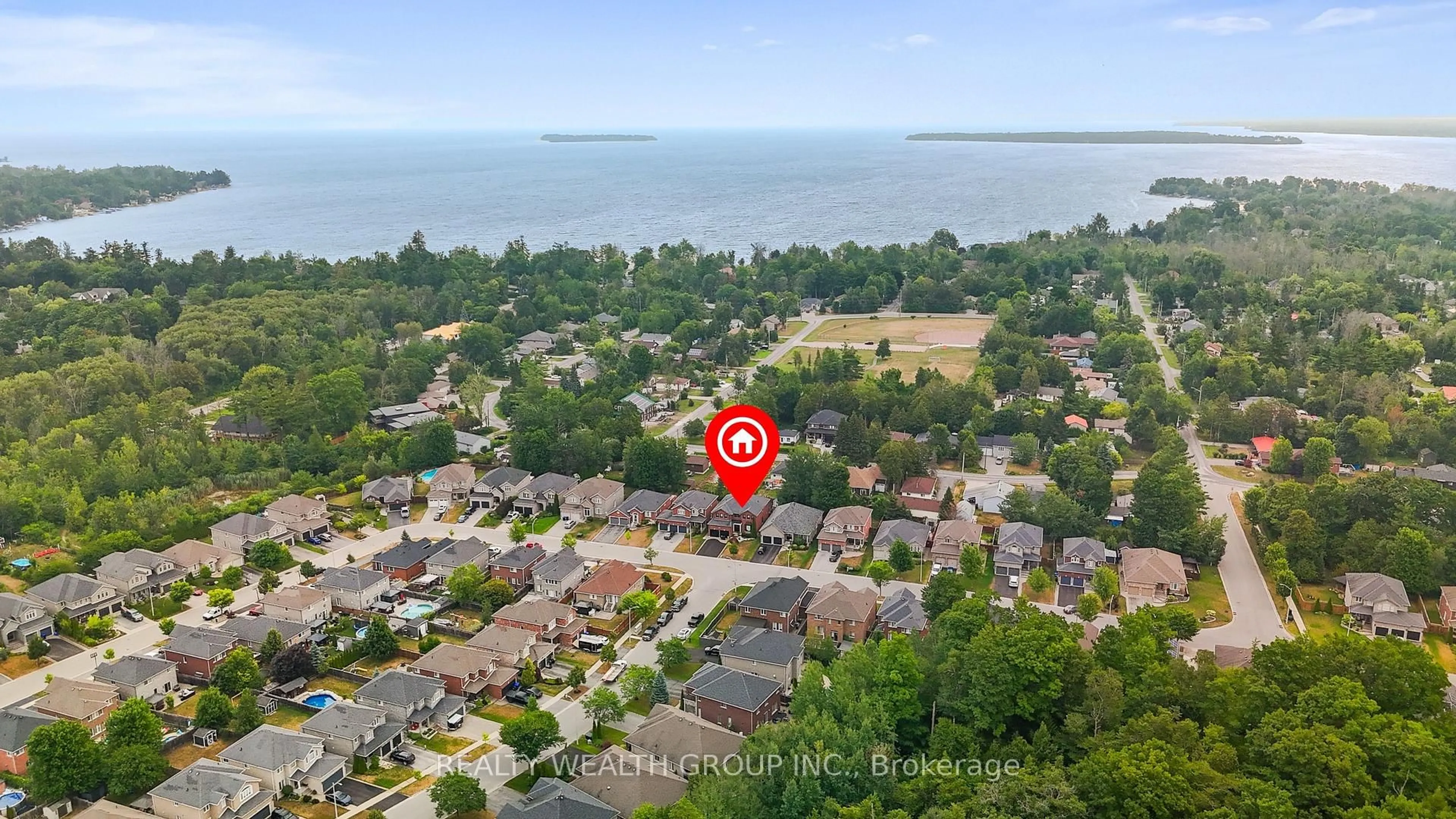 A pic from outside/outdoor area/front of a property/back of a property/a pic from drone, water/lake/river/ocean view for 896 Booth Ave, Innisfil Ontario L9S 0A5