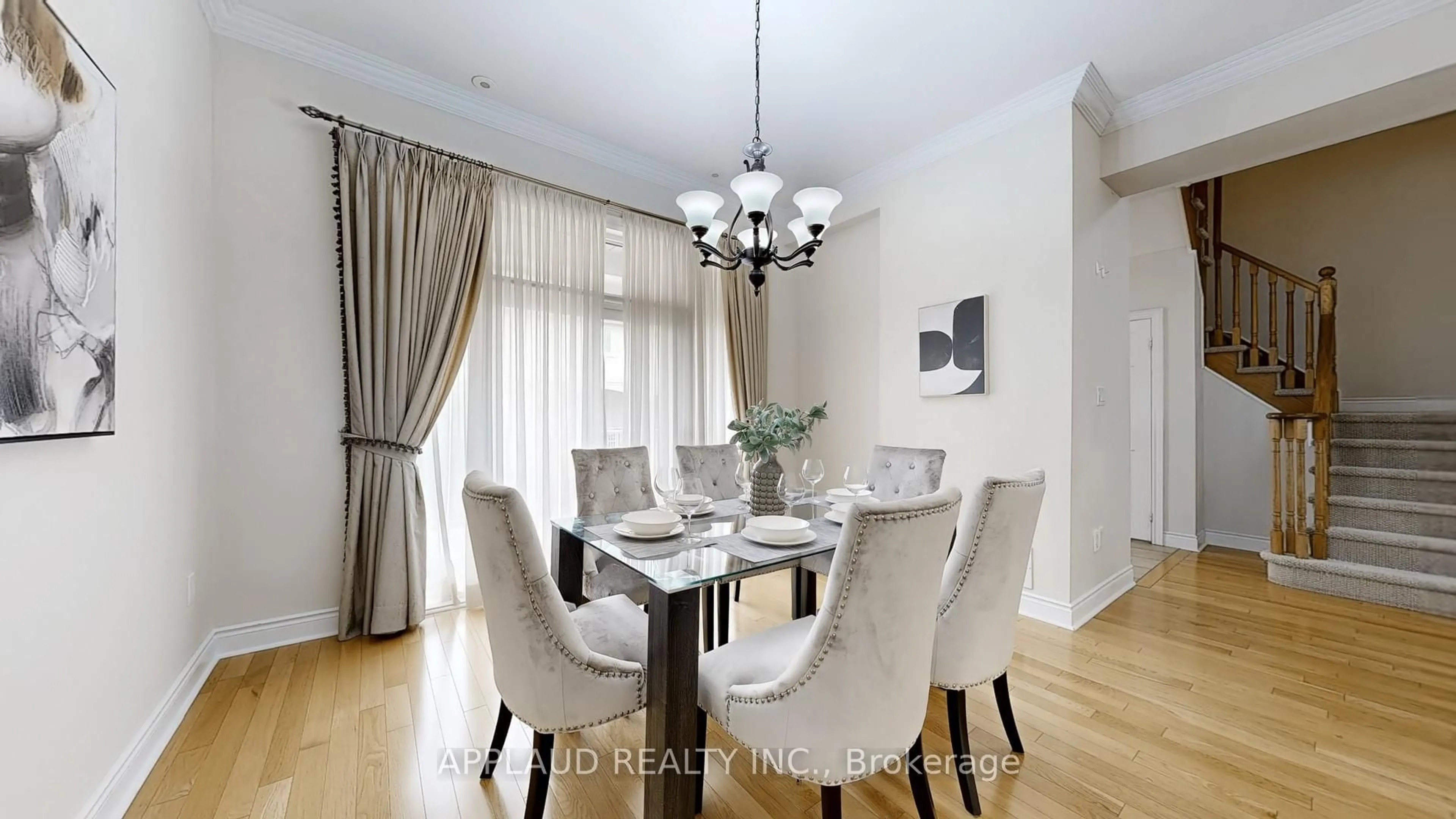 Dining room, wood/laminate floor for 75 Legends Way, Markham Ontario L3R 6B1