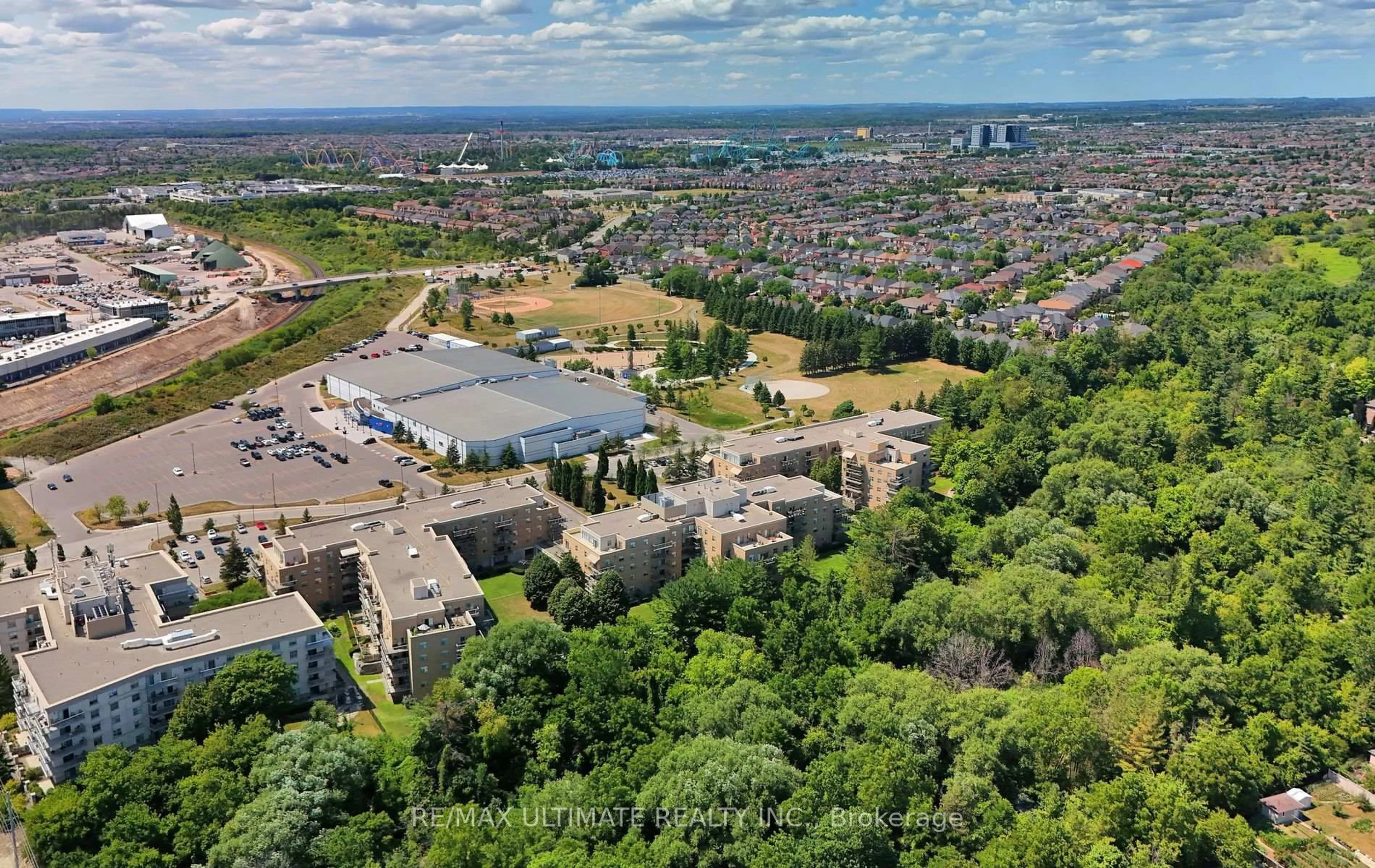 A pic from outside/outdoor area/front of a property/back of a property/a pic from drone, unknown for 2500 Rutherford Rd #307, Vaughan Ontario L4K 5N7