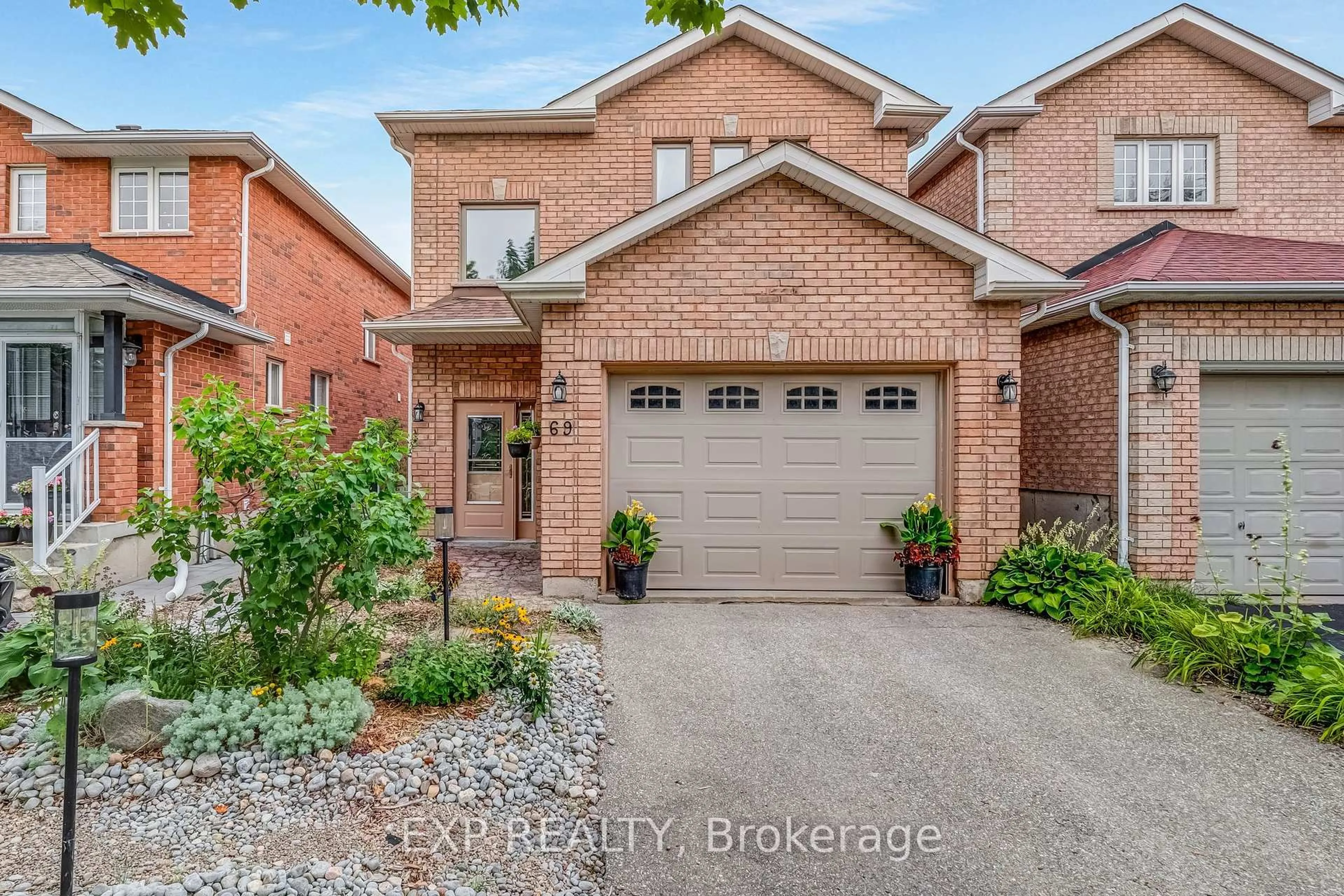 Home with brick exterior material, street for 69 Clearmeadow Blvd, Newmarket Ontario L3X 2M6