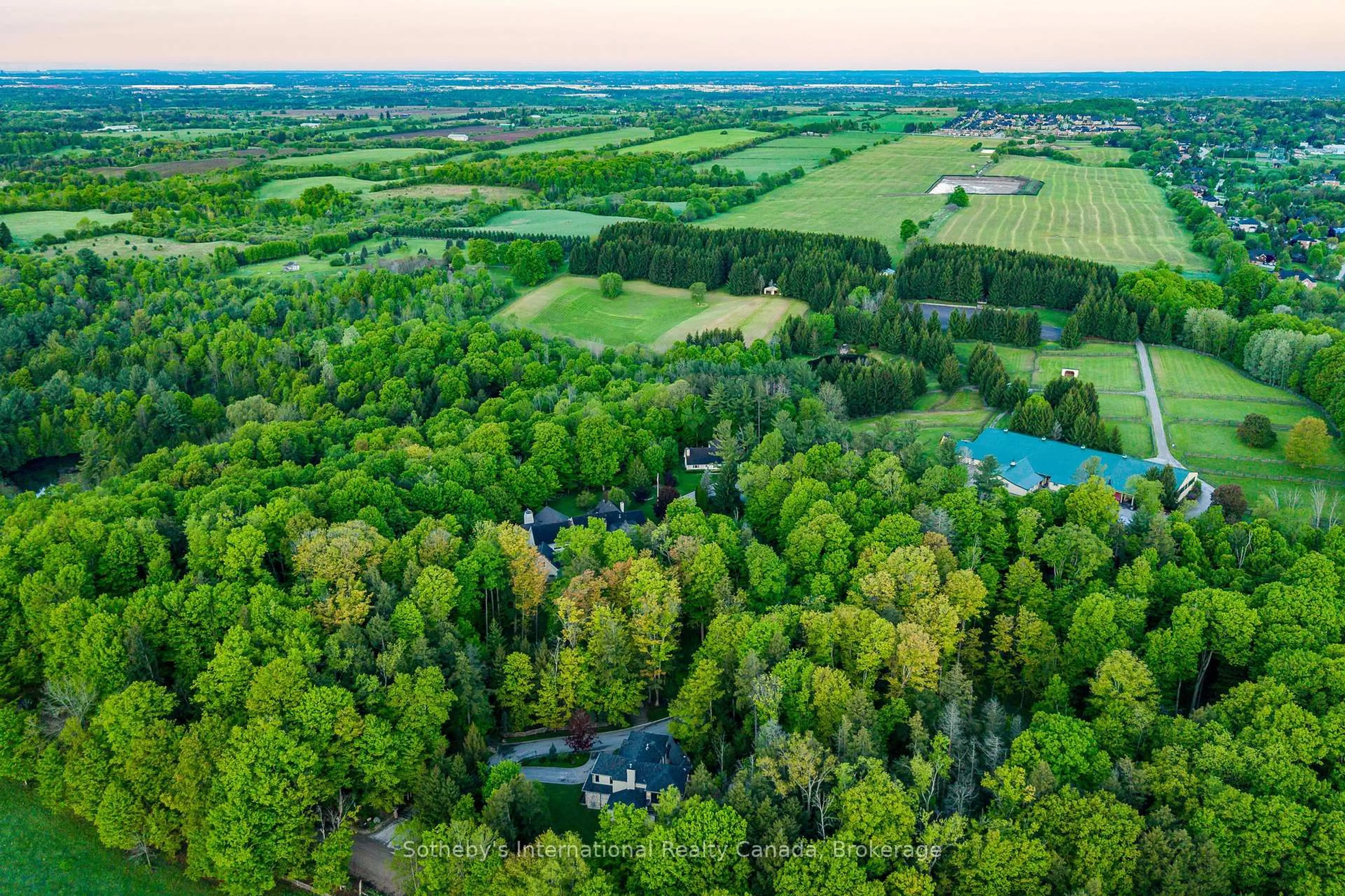 A pic from outside/outdoor area/front of a property/back of a property/a pic from drone, forest/trees view for 12800 8th Concession, King Ontario L7B 1K4