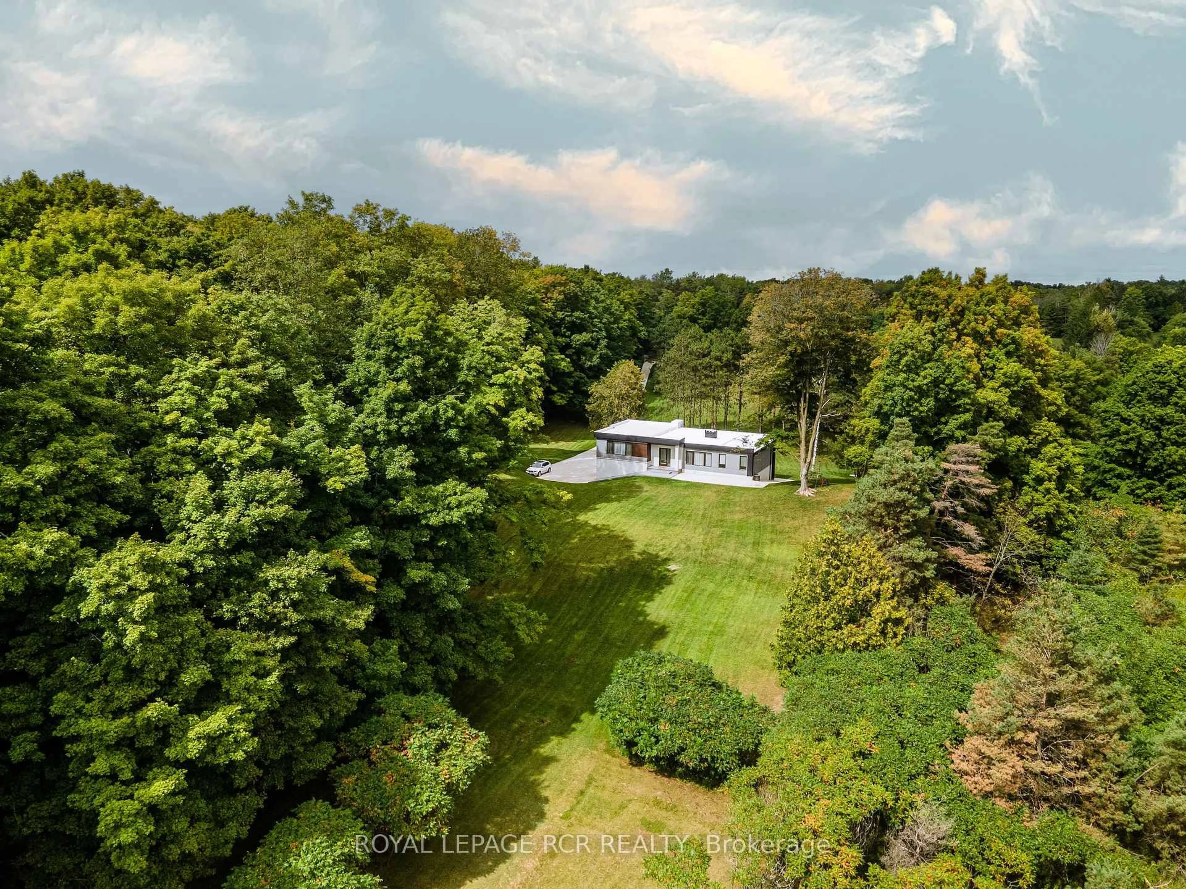 A pic from outside/outdoor area/front of a property/back of a property/a pic from drone, forest/trees view for 7483 Adjala 5th Sdrd, New Tecumseth Ontario L0G 1W0