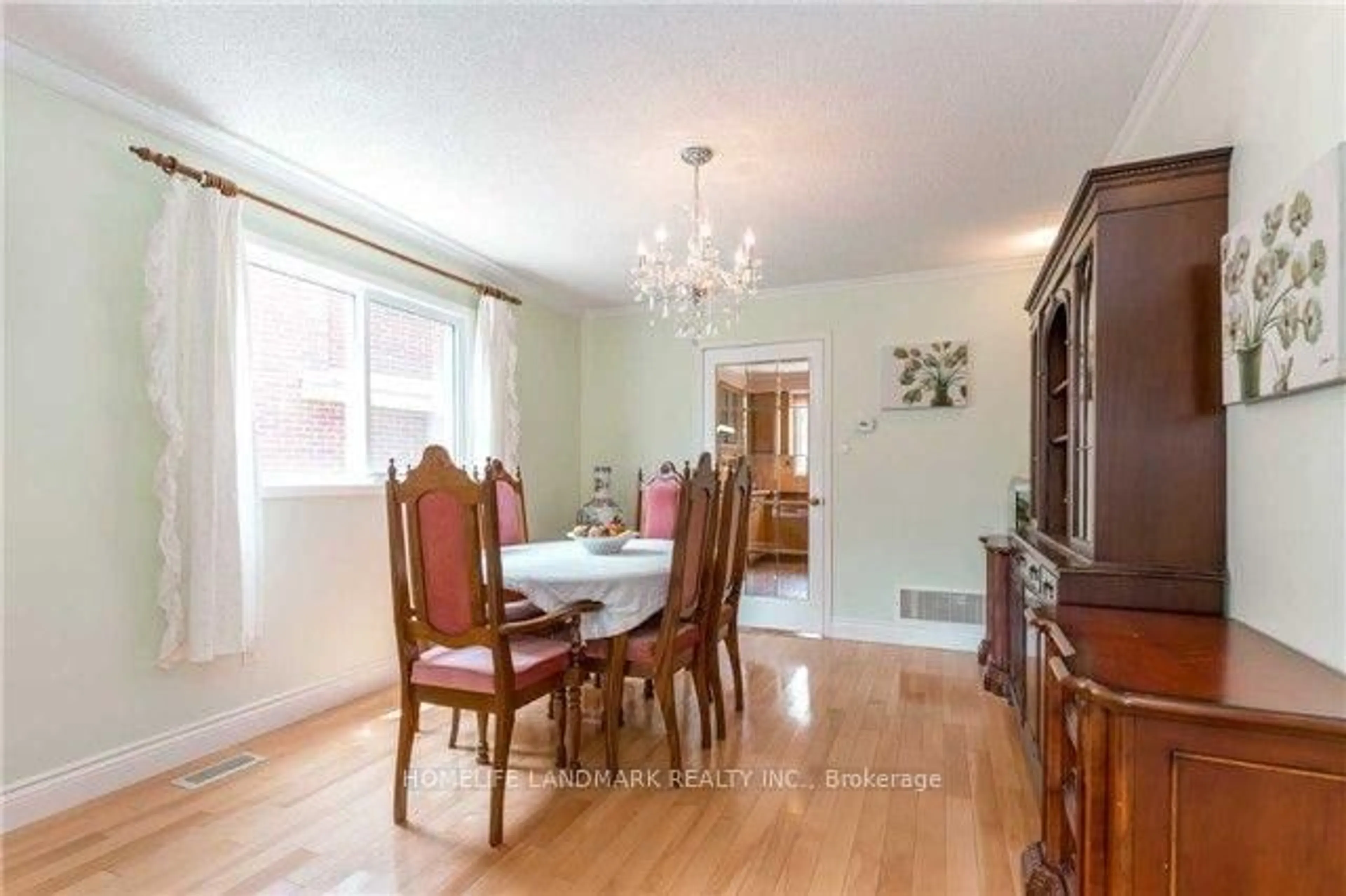 Dining room, wood/laminate floor for 242 Raymerville Dr, Markham Ontario L3P 6S1