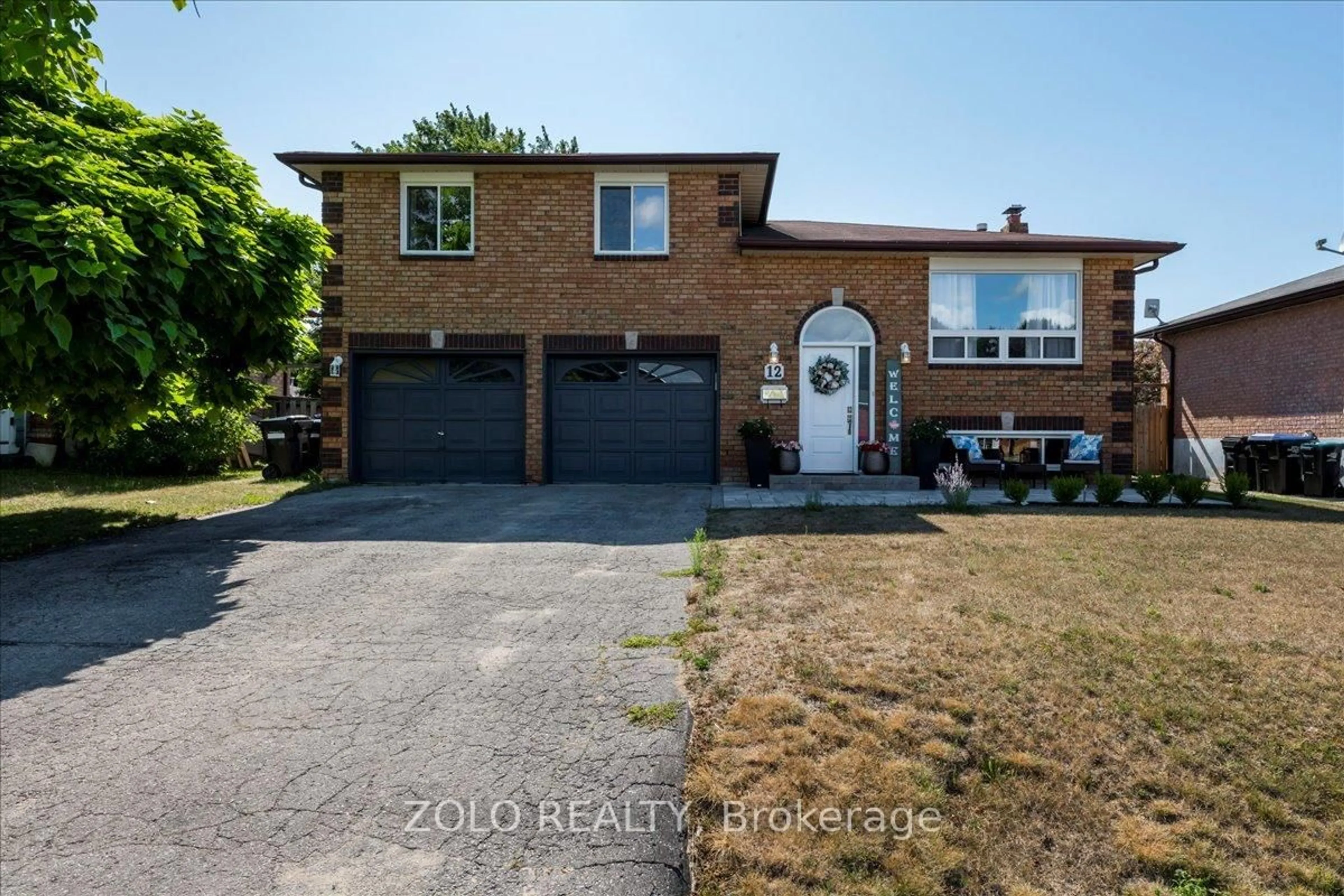 Home with brick exterior material, street for 12 Mansonic Way, Essa Ontario L3W 0J7