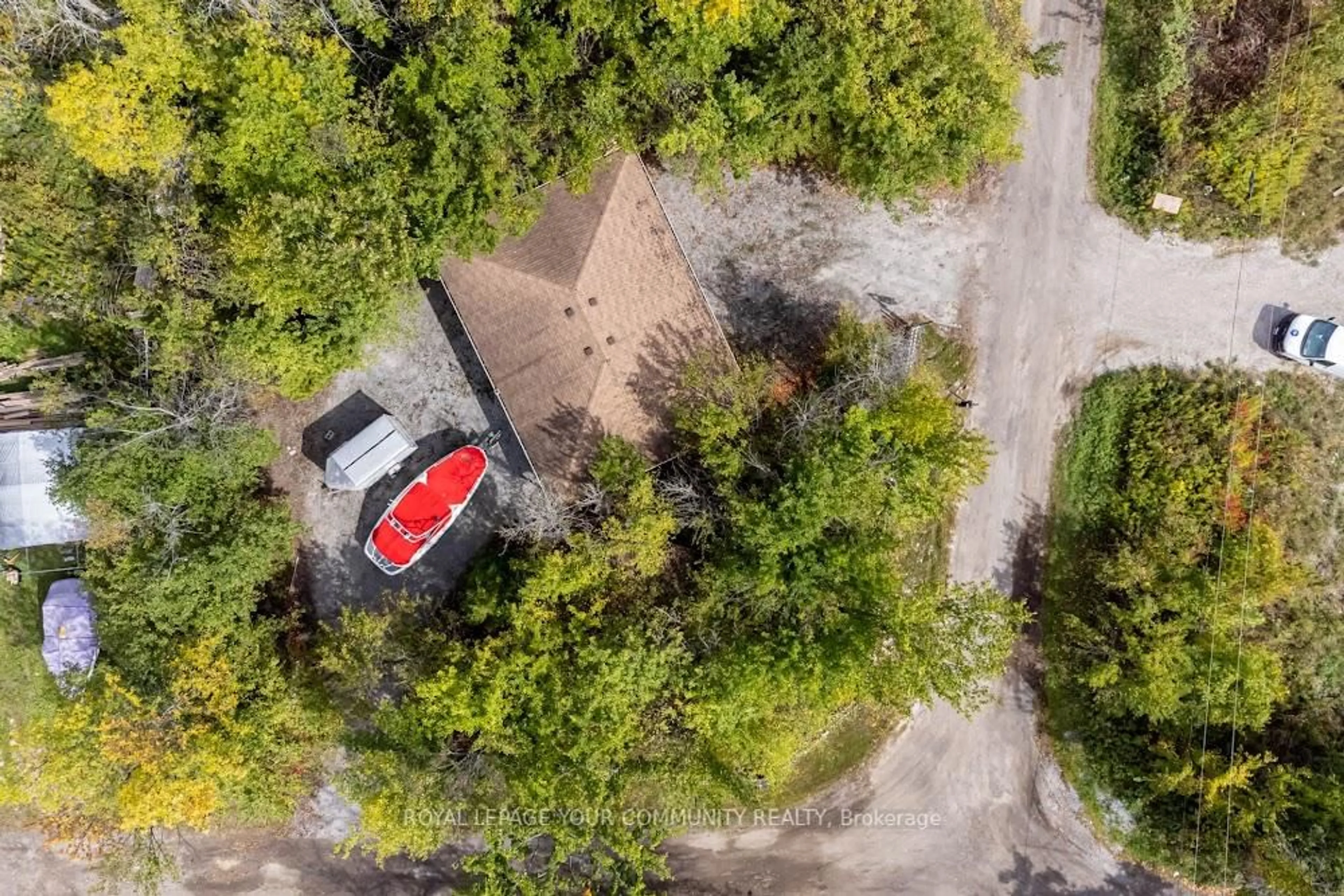 A pic from outside/outdoor area/front of a property/back of a property/a pic from drone, forest/trees view for 537 Eagle Rd, Georgina Islands Ontario L0E 1R0