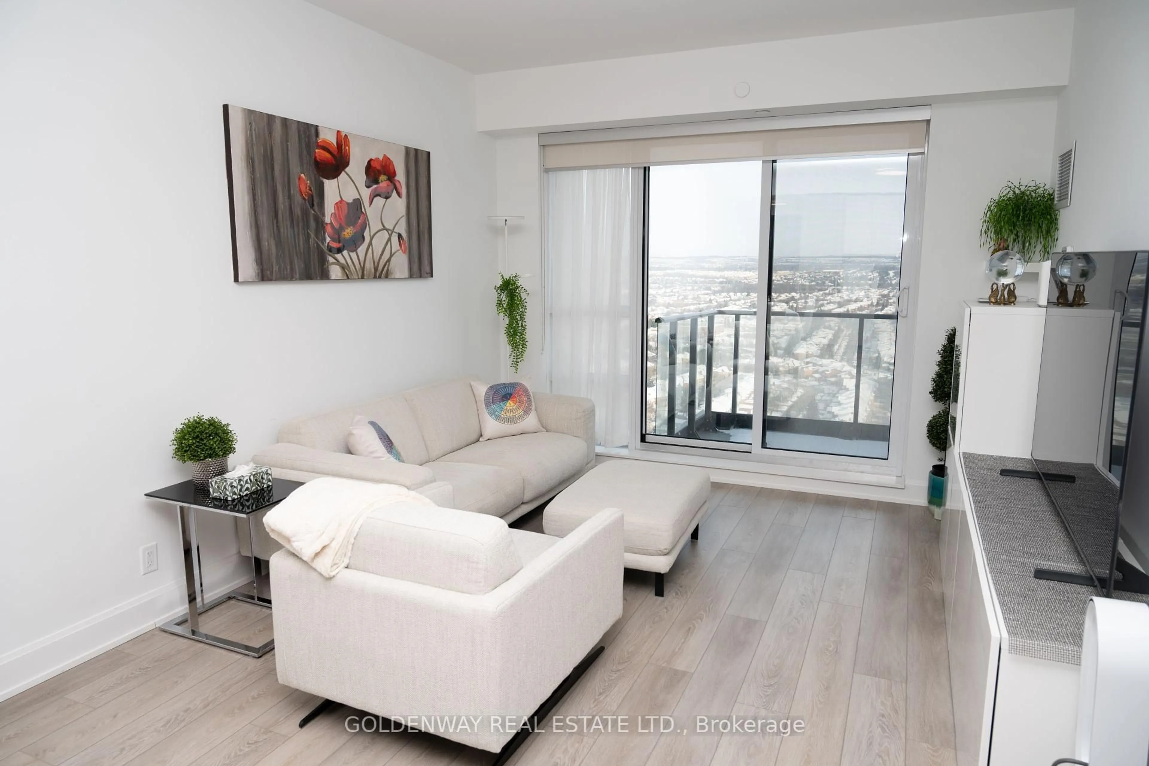 Living room with furniture, wood/laminate floor for 38 Gandhi Lane #2902, Markham Ontario L3T 0G9