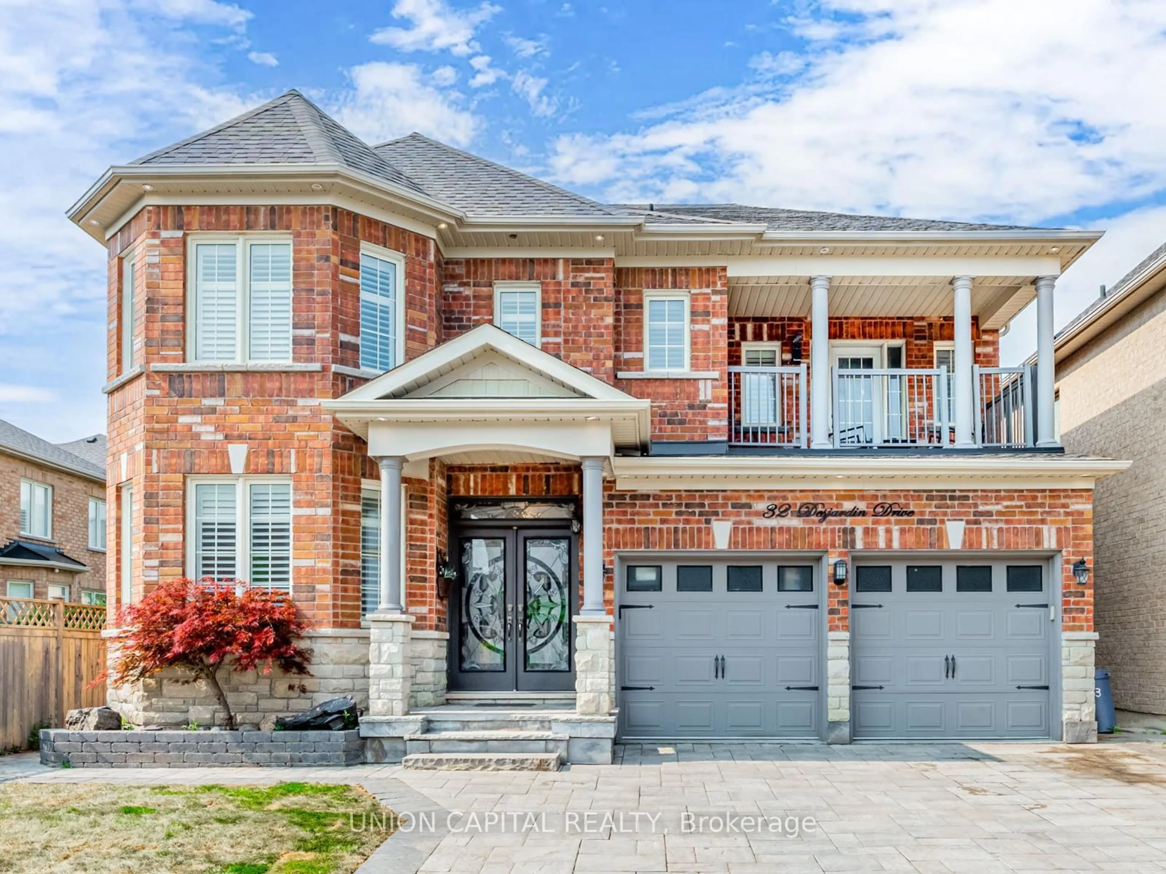 Home with brick exterior material, street for 32 Desjardin Dr, Markham Ontario L6E 0M2