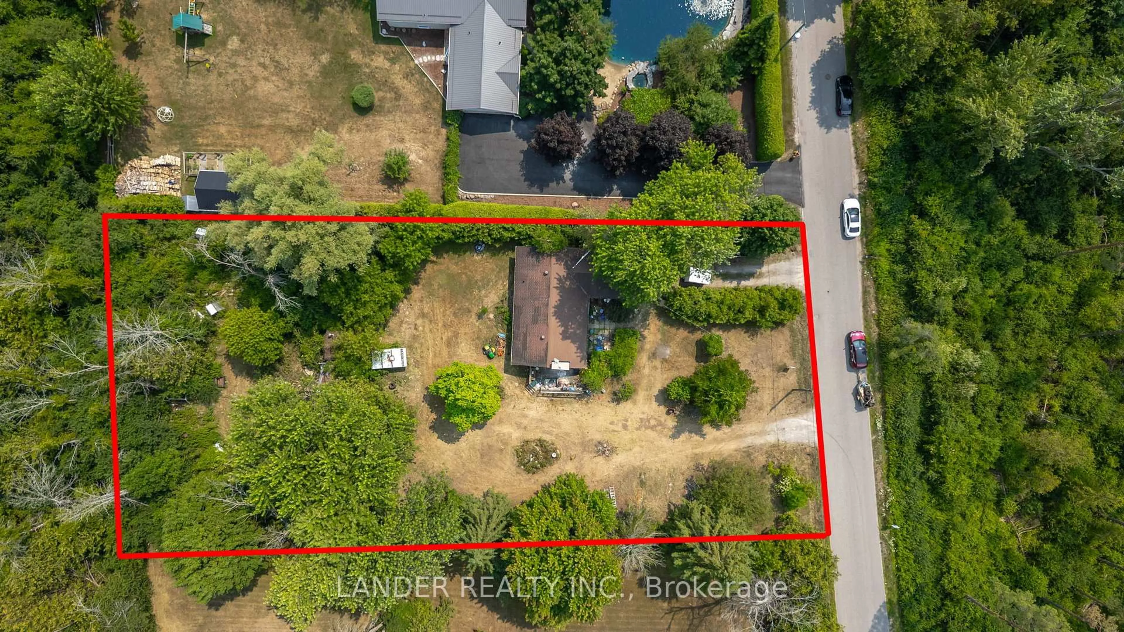 A pic from outside/outdoor area/front of a property/back of a property/a pic from drone, water/lake/river/ocean view for 683 Varney Rd, Georgina Ontario L4P 3E9