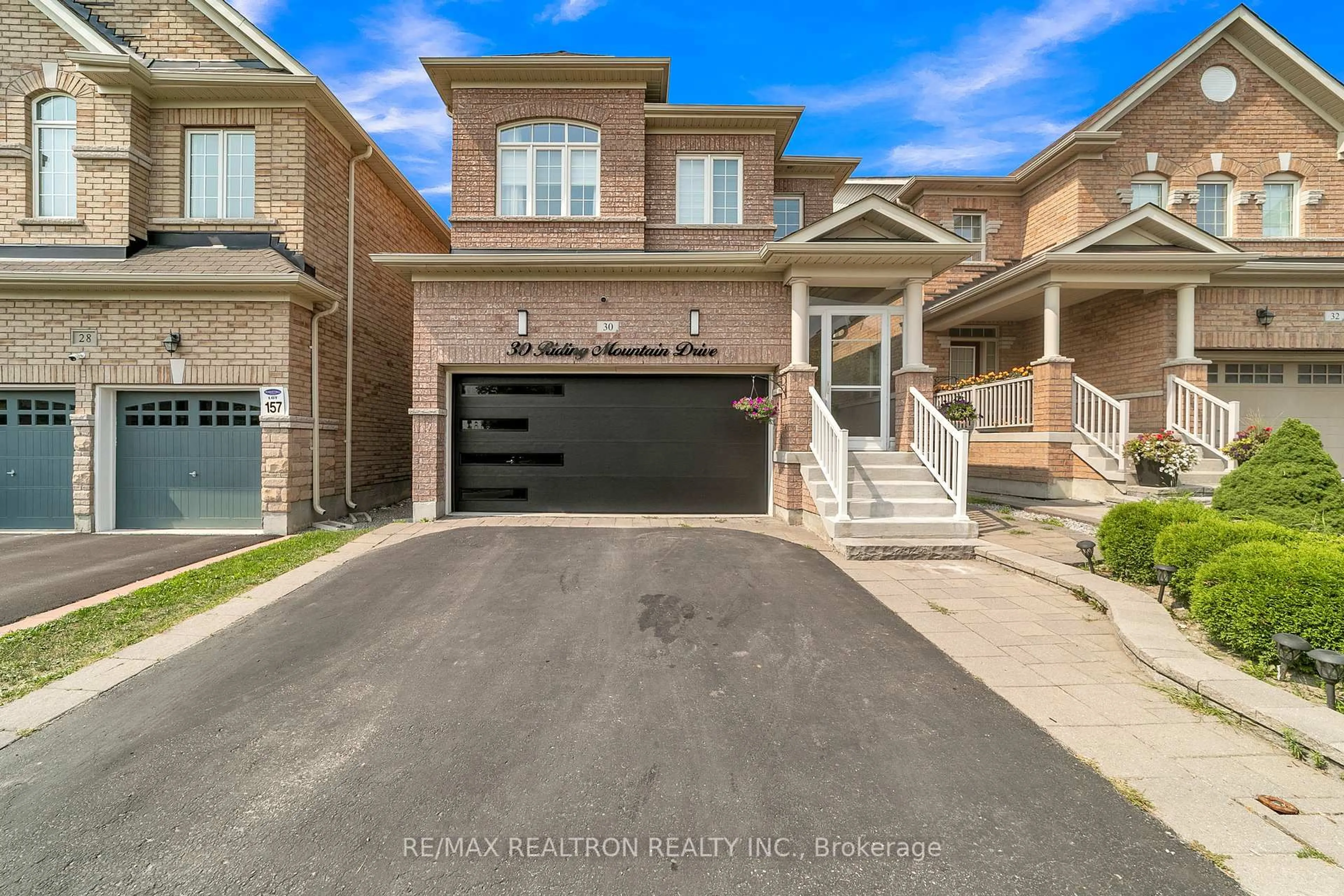 Home with brick exterior material, street for 30 Riding Mountain Dr, Richmond Hill Ontario L4E 0V4