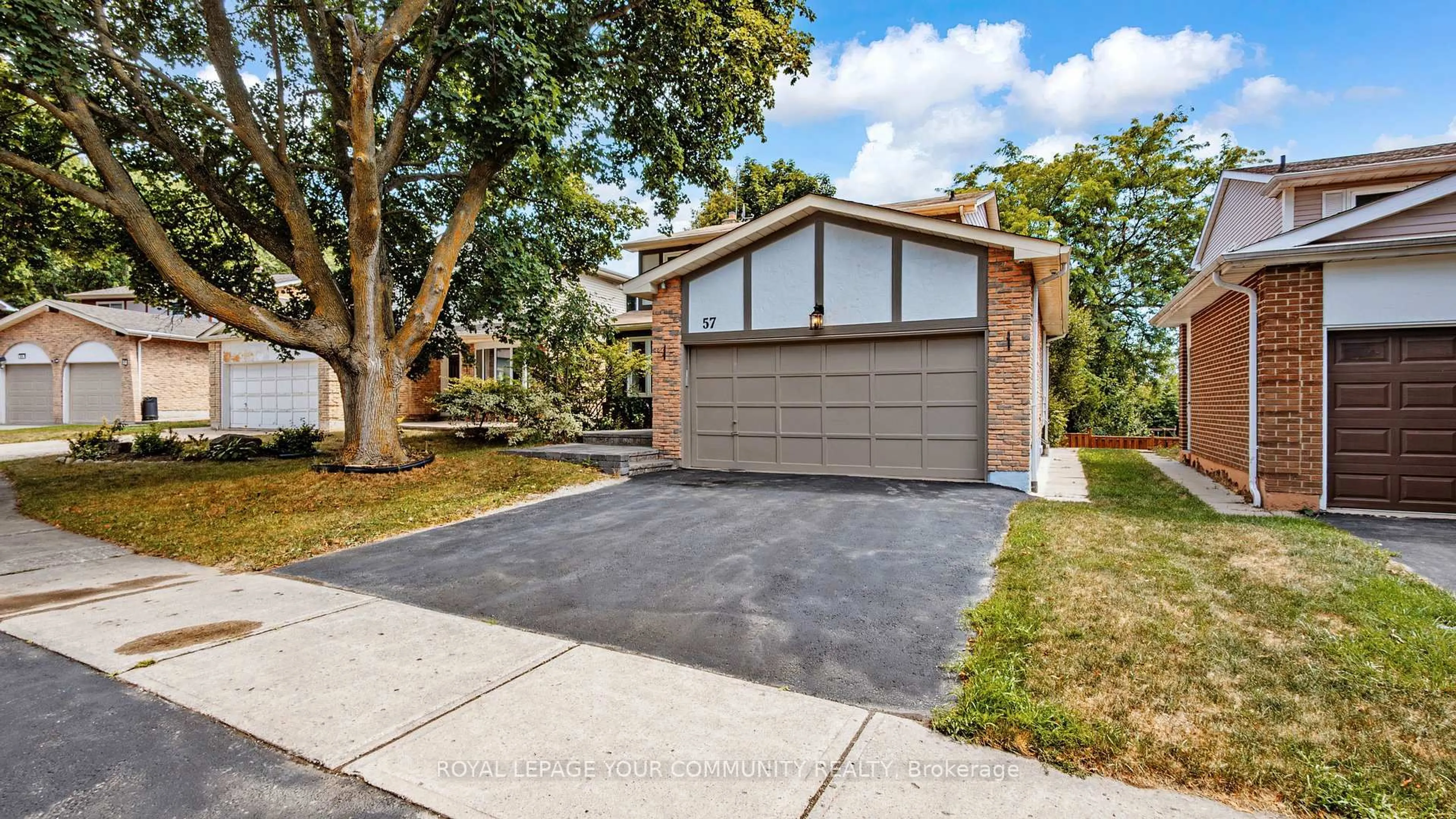 Home with brick exterior material, street for 57 Braeburn Dr, Markham Ontario L3T 4W7
