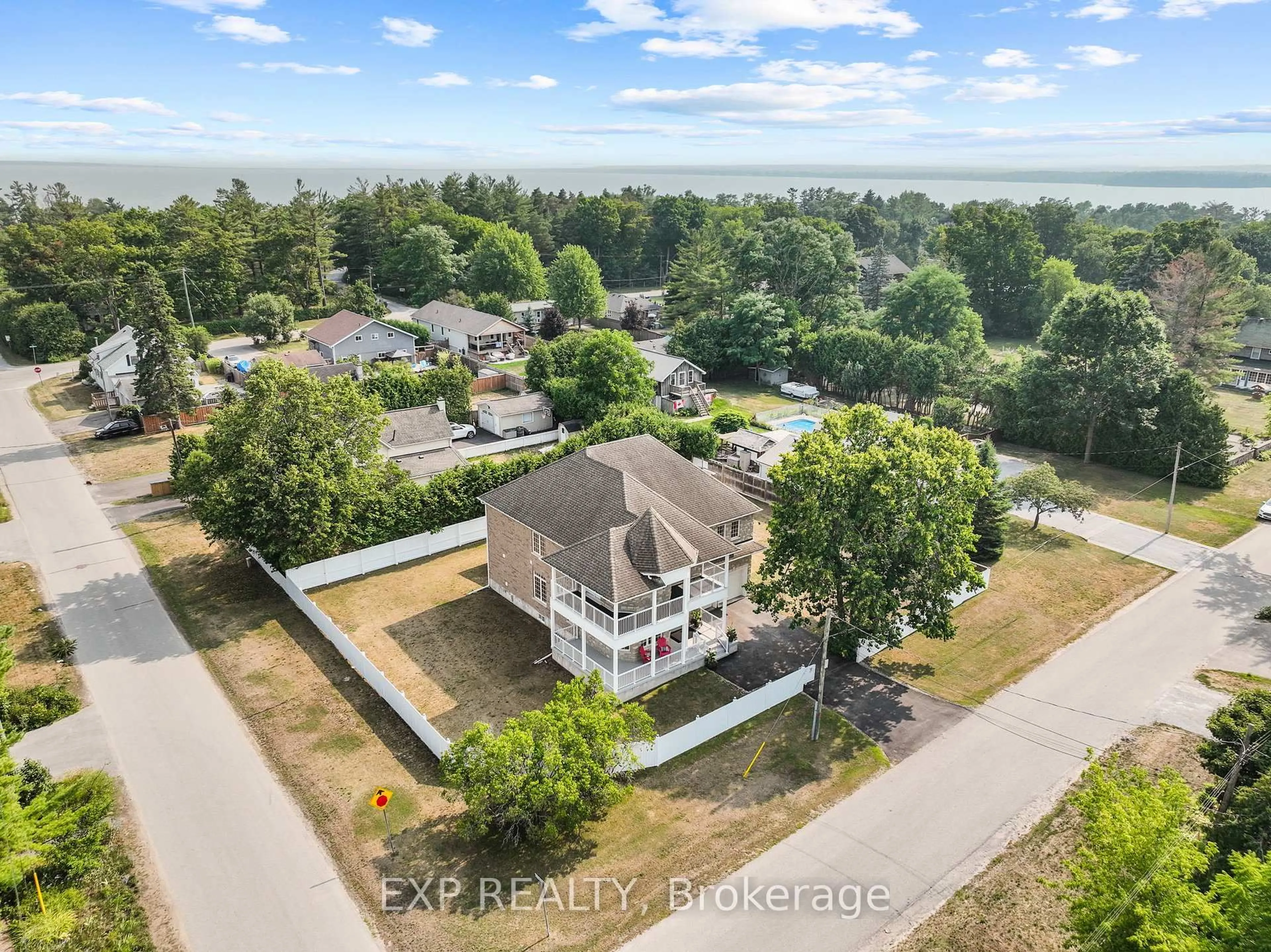 A pic from outside/outdoor area/front of a property/back of a property/a pic from drone, water/lake/river/ocean view for 371 Raines St, Georgina Ontario L4P 3C8