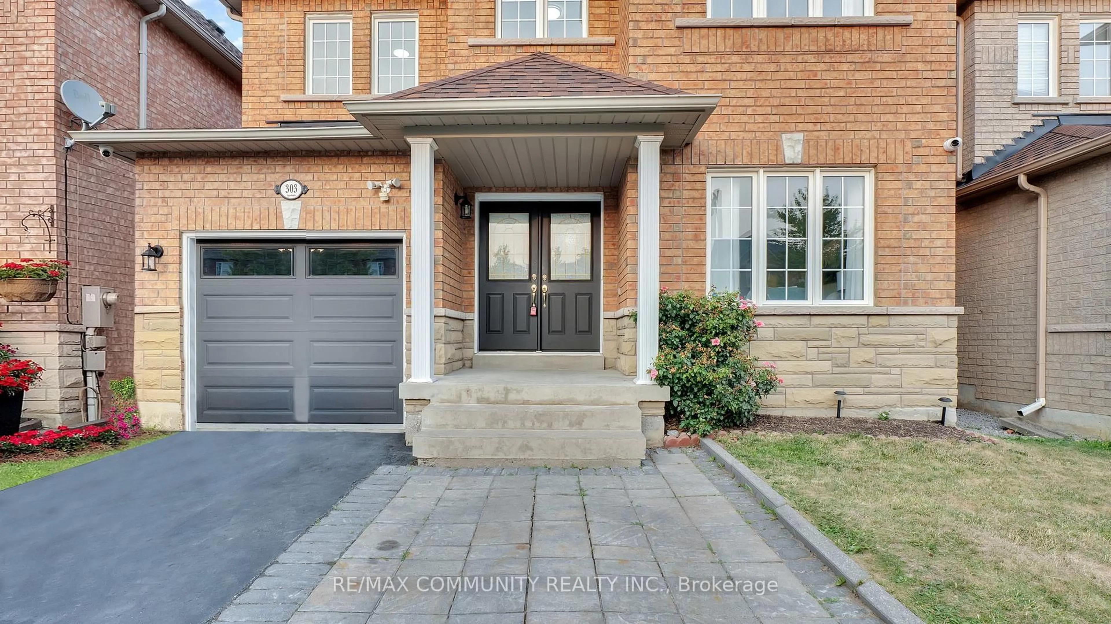 Home with brick exterior material, street for 303 Williamson Rd, Markham Ontario L6E 2A7