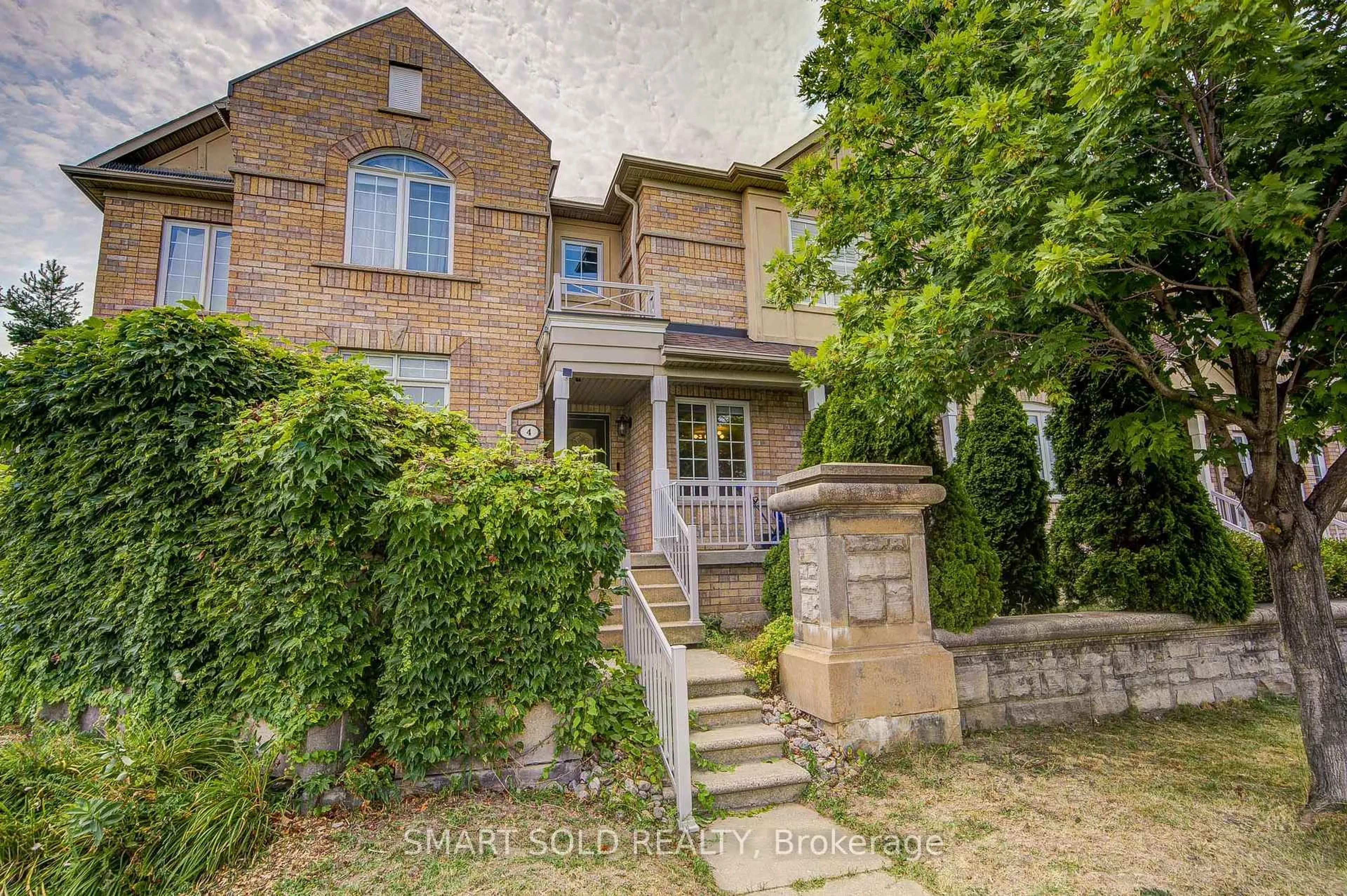 Home with brick exterior material, street for 4 Thornhill Woods Dr, Vaughan Ontario L4J 8V3