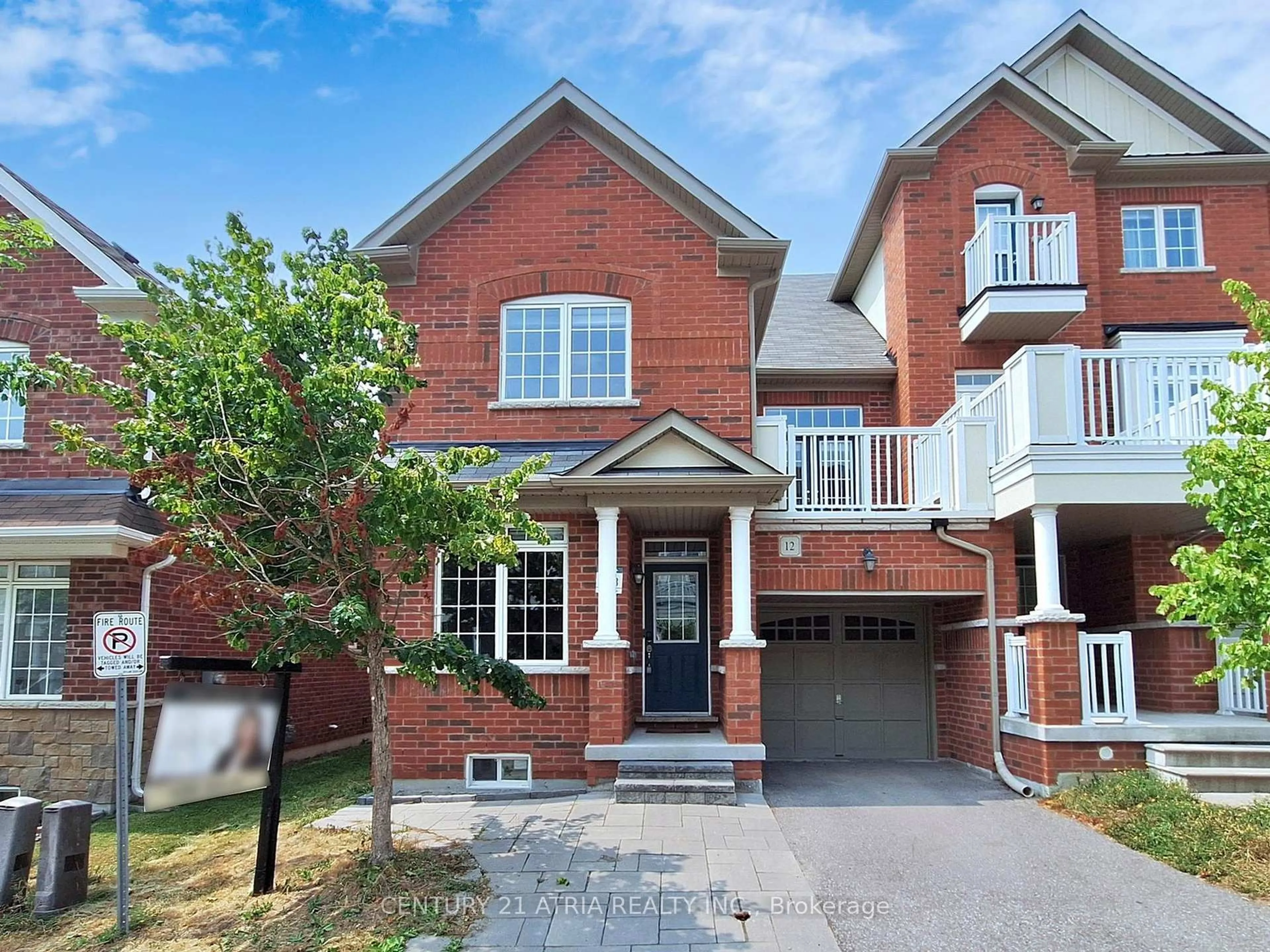 Home with brick exterior material, street for 12 Roy Grove Way, Markham Ontario L6E 0T6
