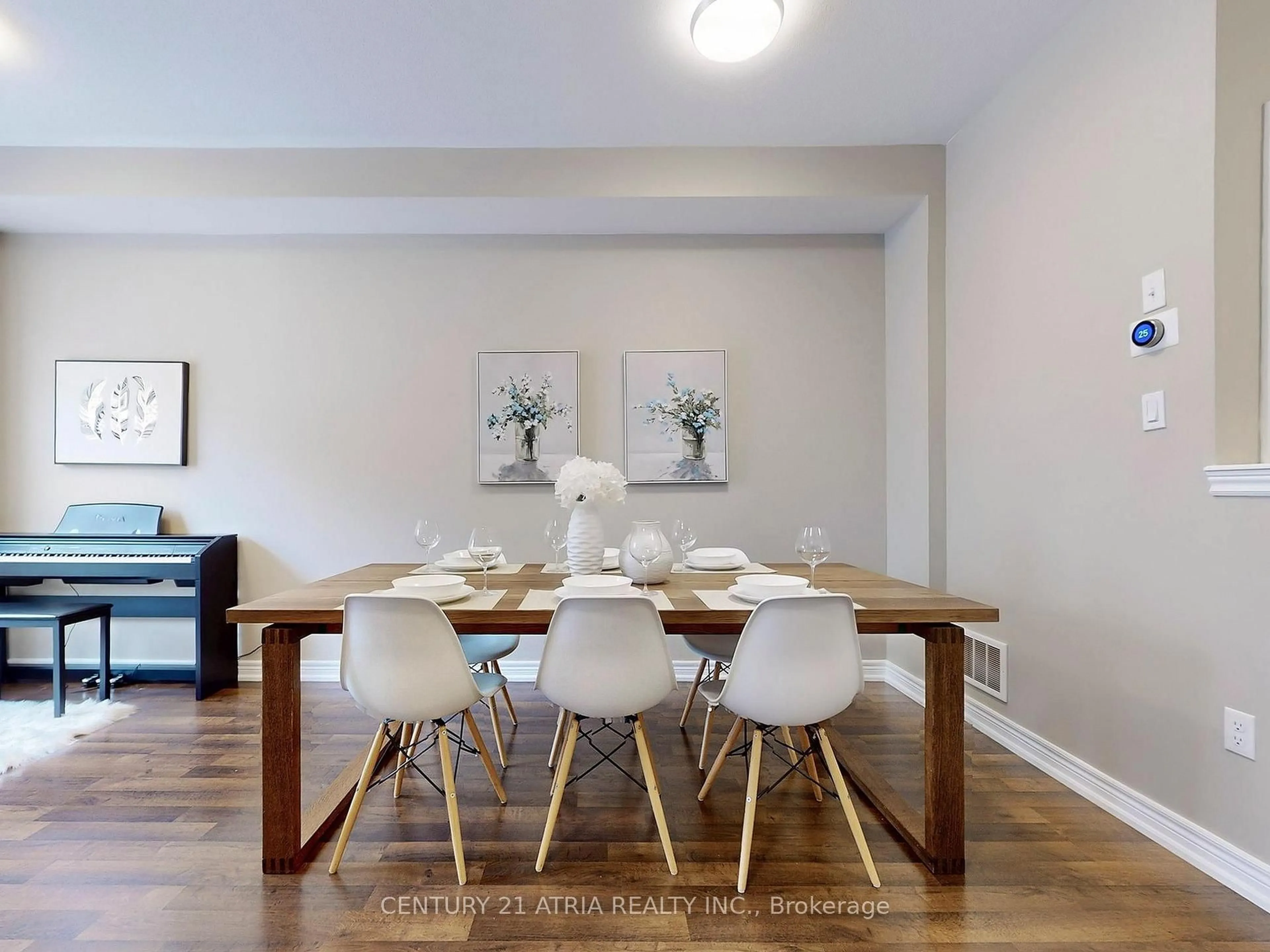 Dining room, wood/laminate floor for 12 Roy Grove Way, Markham Ontario L6E 0T6