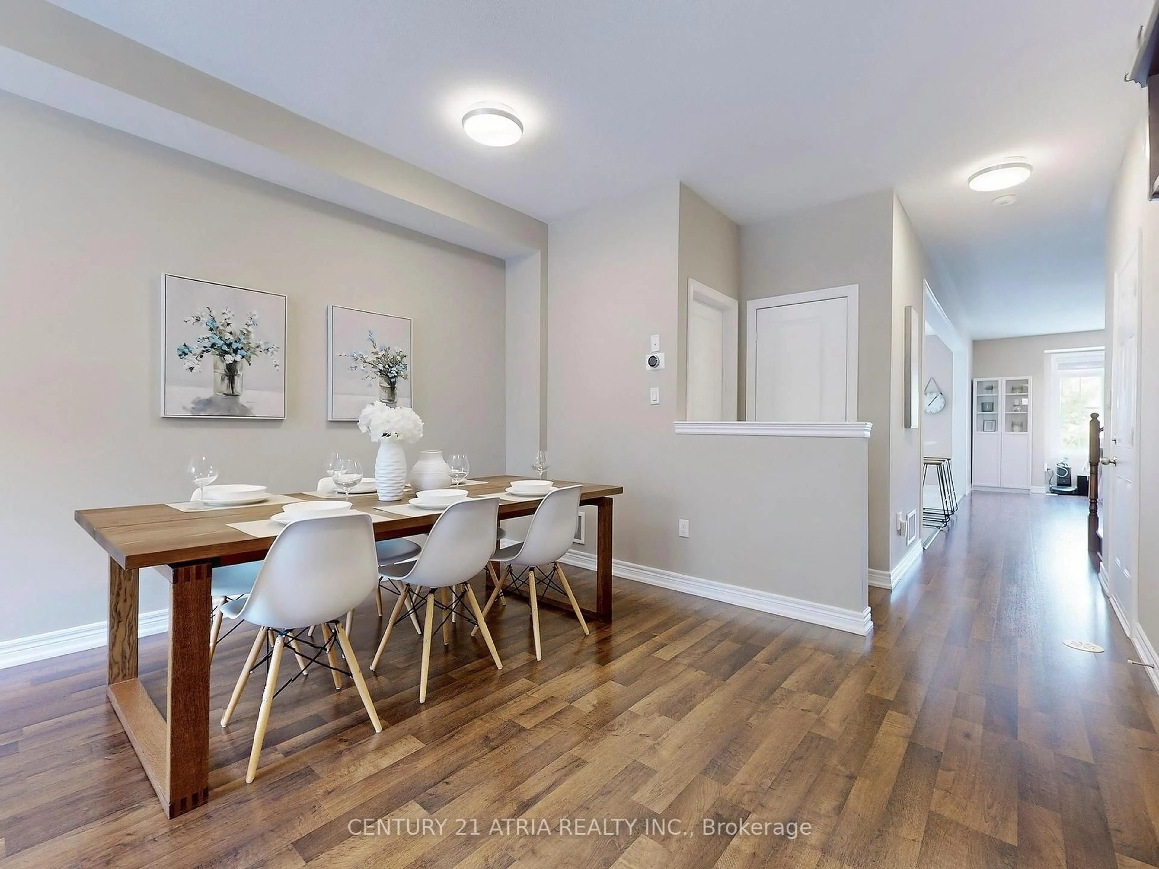 Dining room, wood/laminate floor for 12 Roy Grove Way, Markham Ontario L6E 0T6