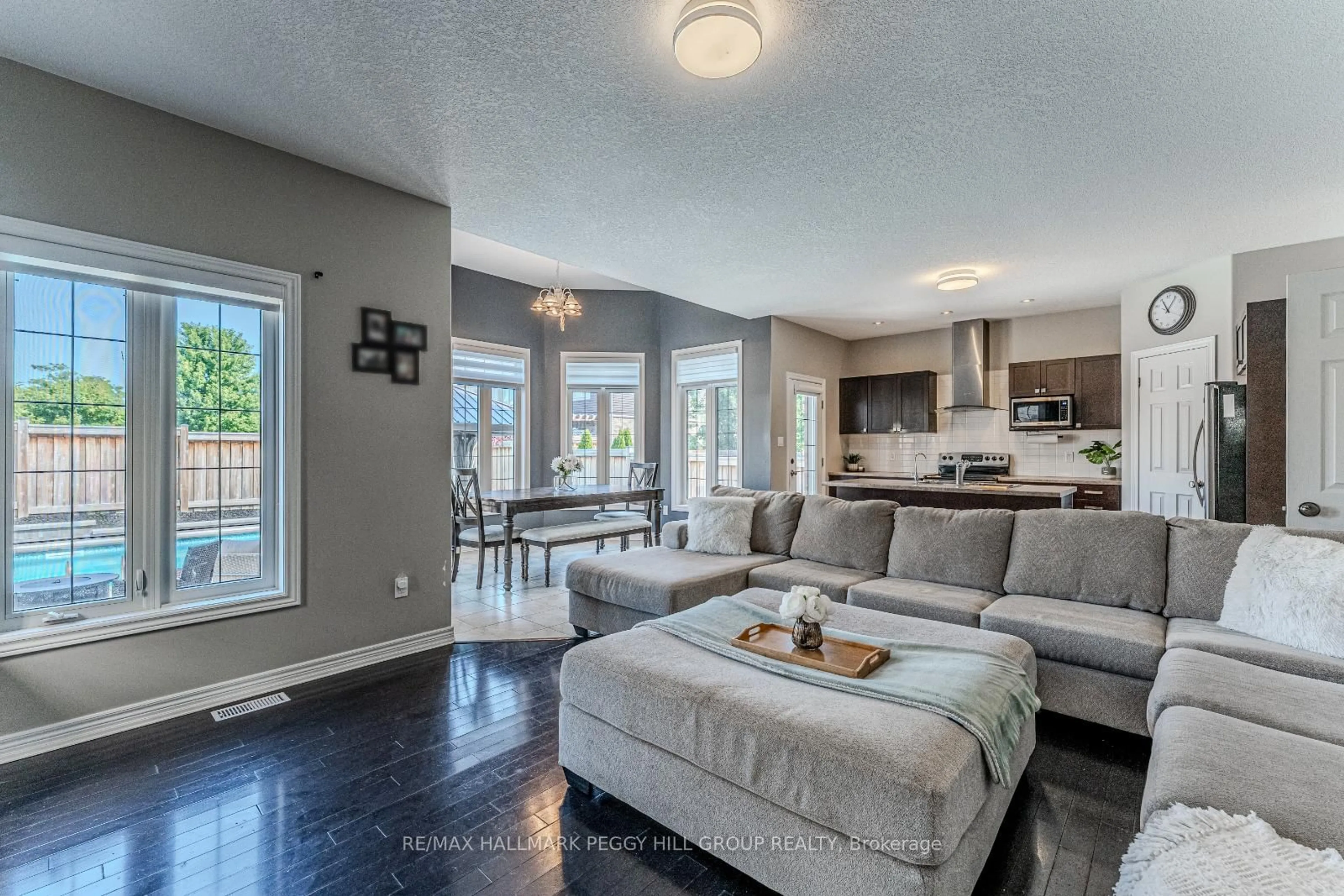 Living room with furniture, unknown for 14 Arnold Cres, Essa Ontario L3W 0P9