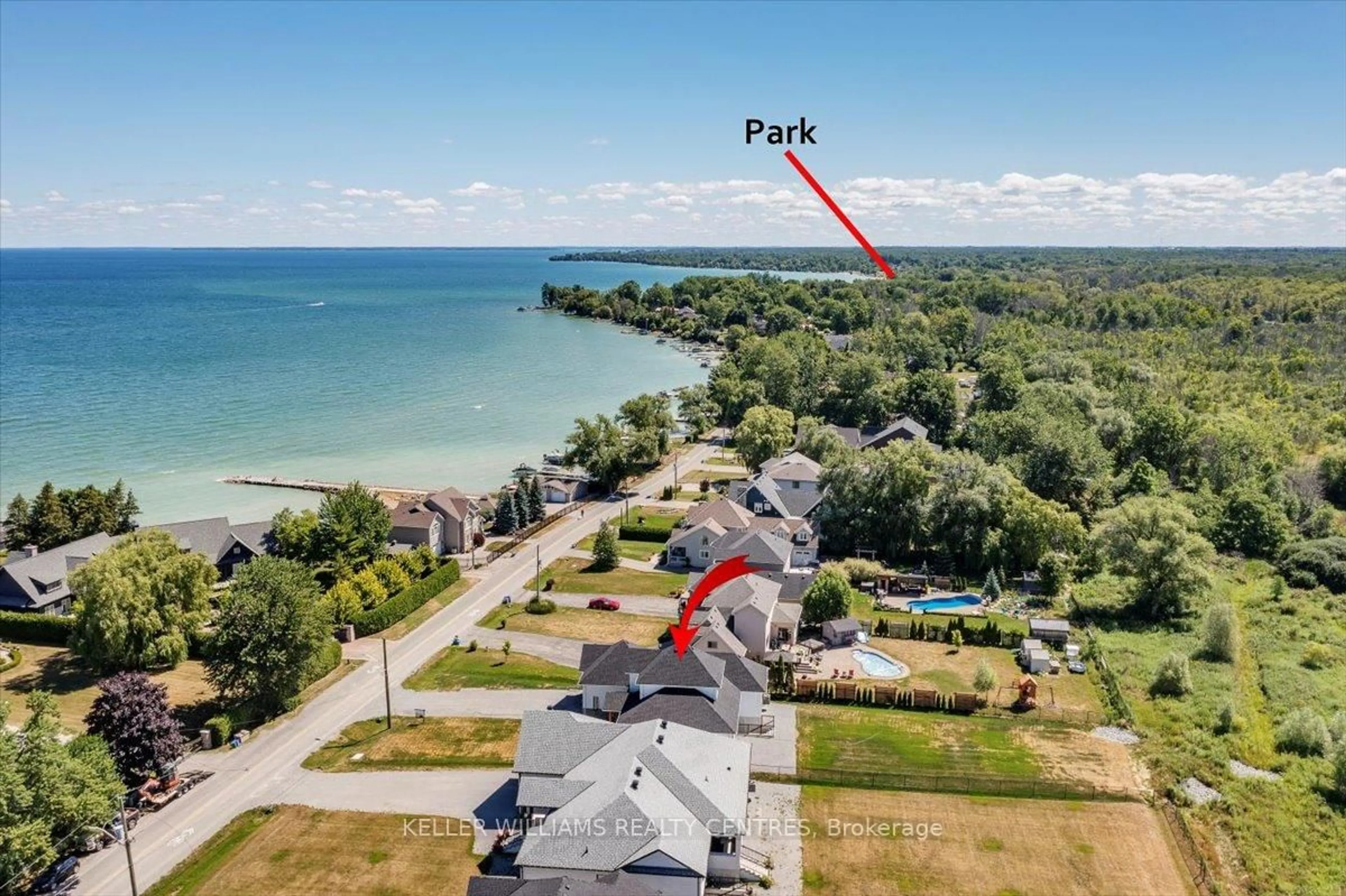 A pic from outside/outdoor area/front of a property/back of a property/a pic from drone, water/lake/river/ocean view for 147 Lake Dr, Georgina Ontario L4P 0S7