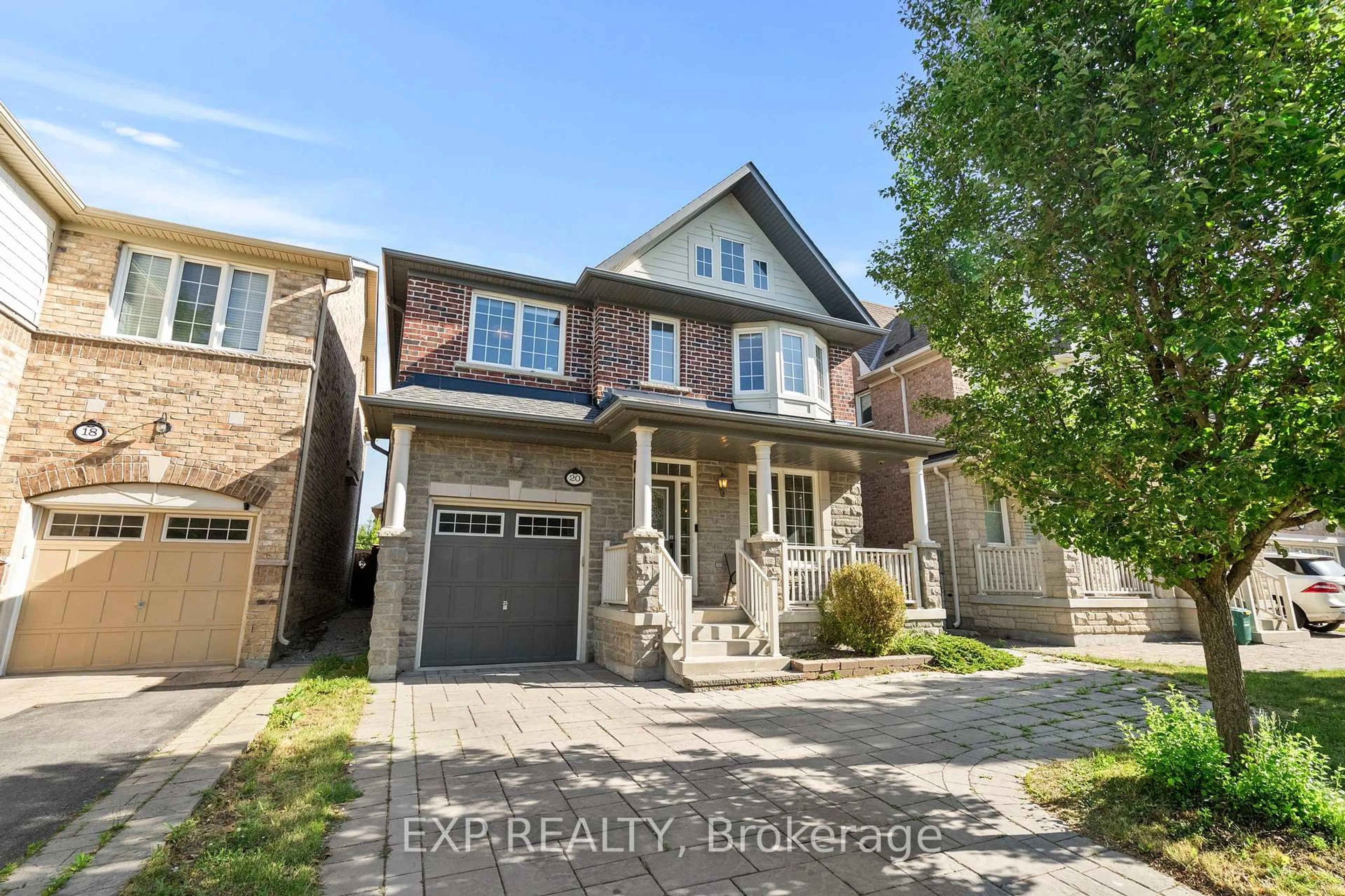 Home with brick exterior material, street for 20 James Joyce Dr, Markham Ontario L6C 0L7