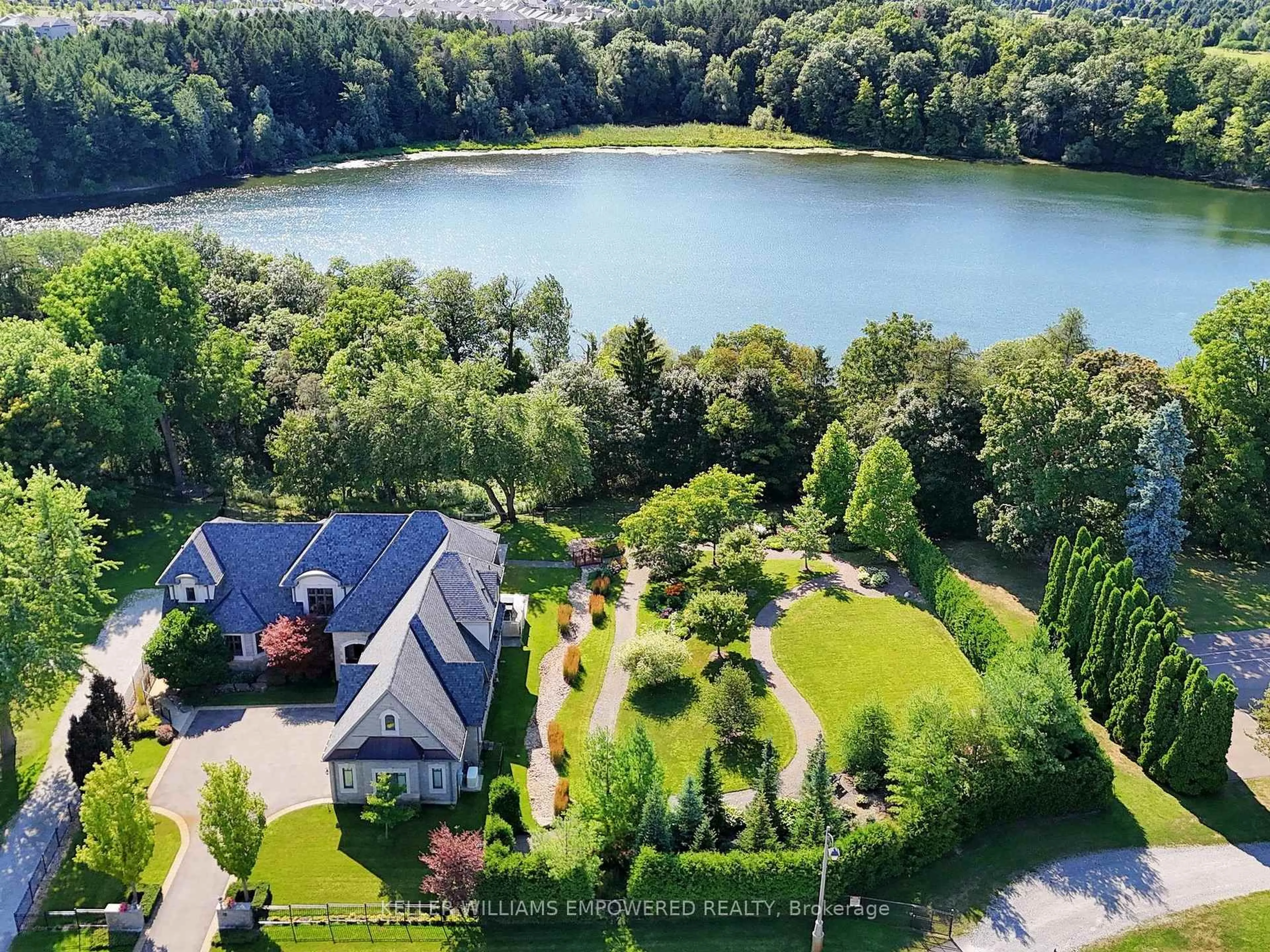 A pic from outside/outdoor area/front of a property/back of a property/a pic from drone, water/lake/river/ocean view for 12 Macleod Estate Crt, Richmond Hill Ontario L4E 0B1