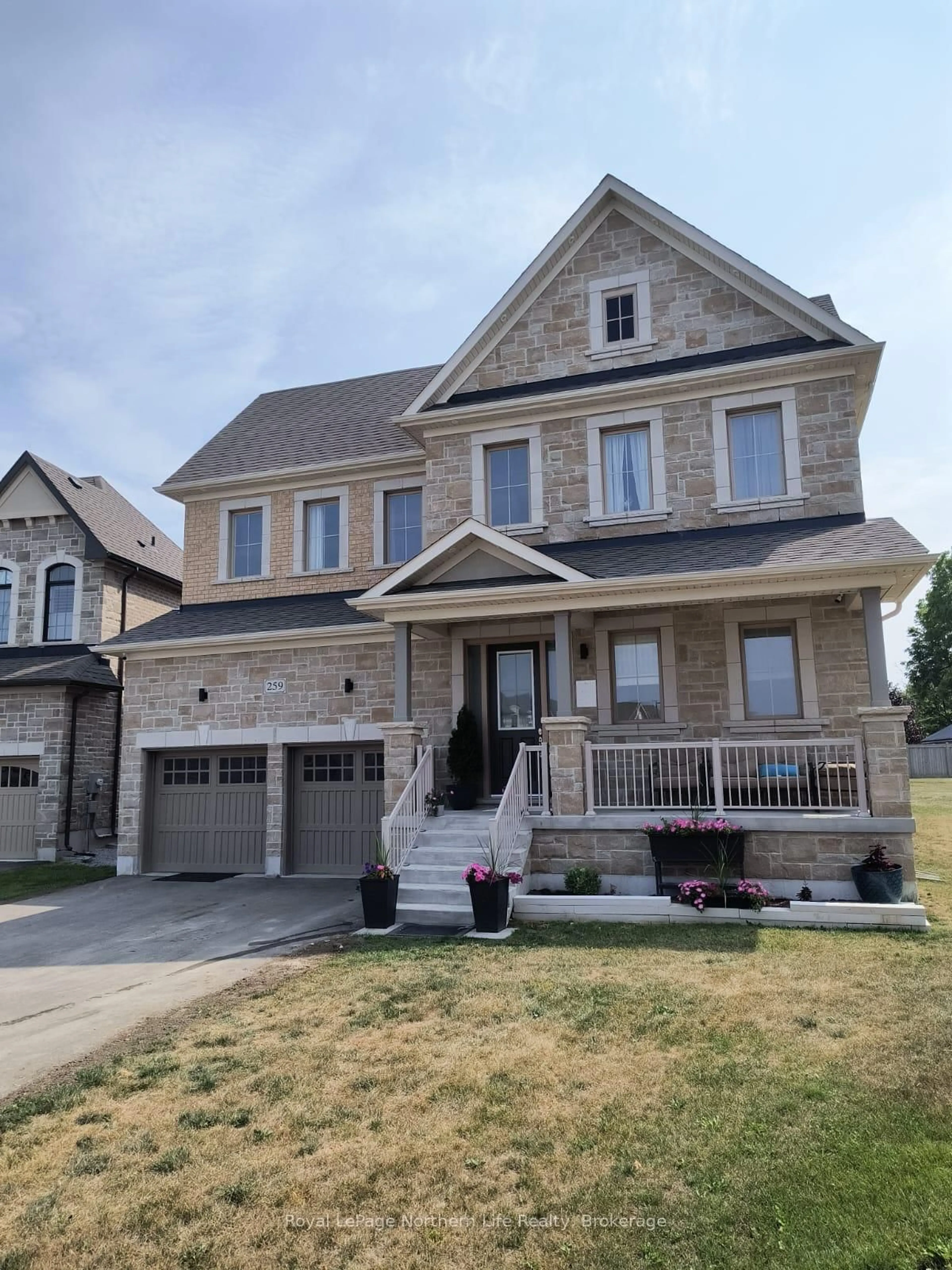 Home with brick exterior material, street for 259 Danny Wheeler Blvd, Georgina Ontario L4P 0J9