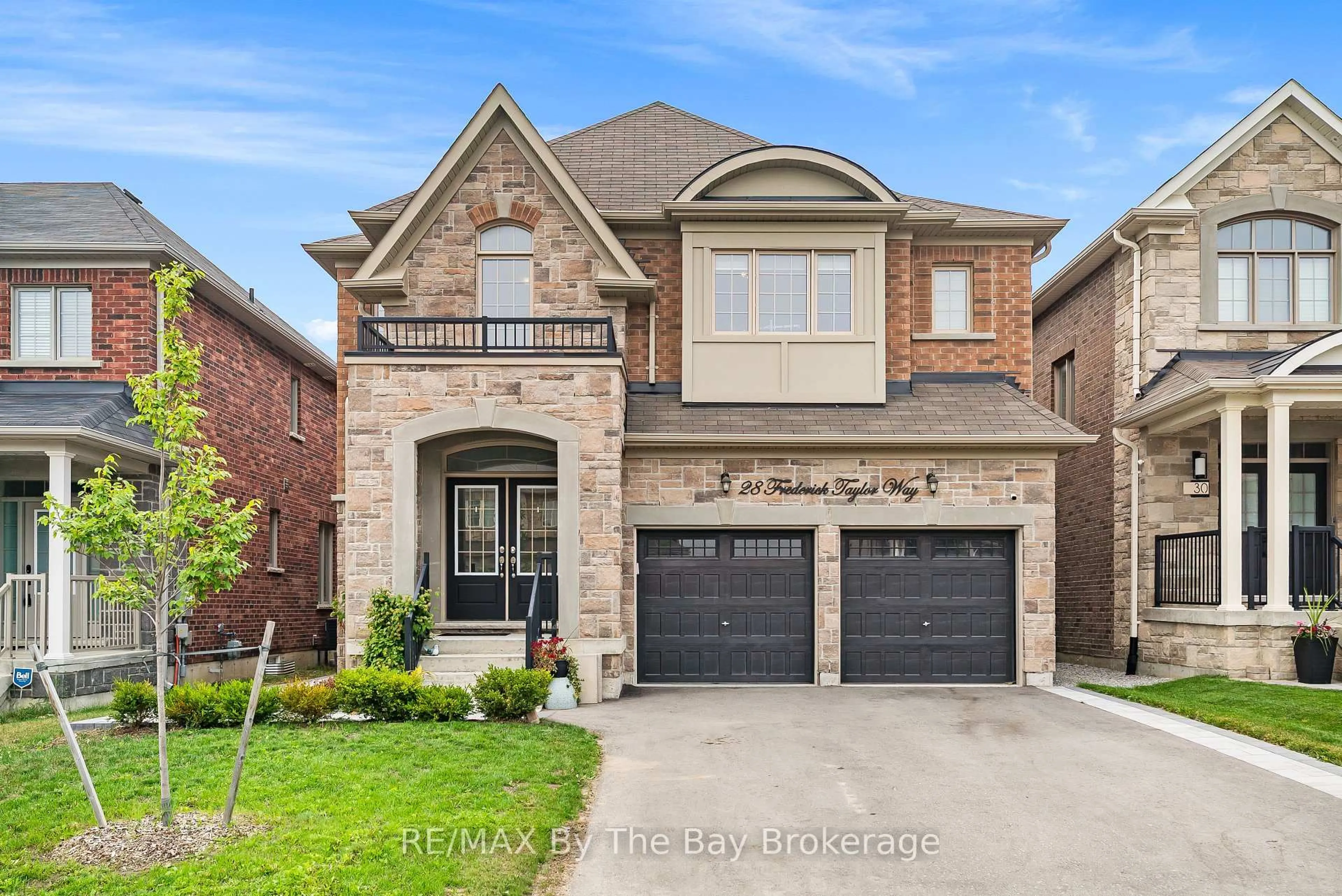 Home with brick exterior material, street for 28 Frederick Taylor Way, East Gwillimbury Ontario L0G 1M0