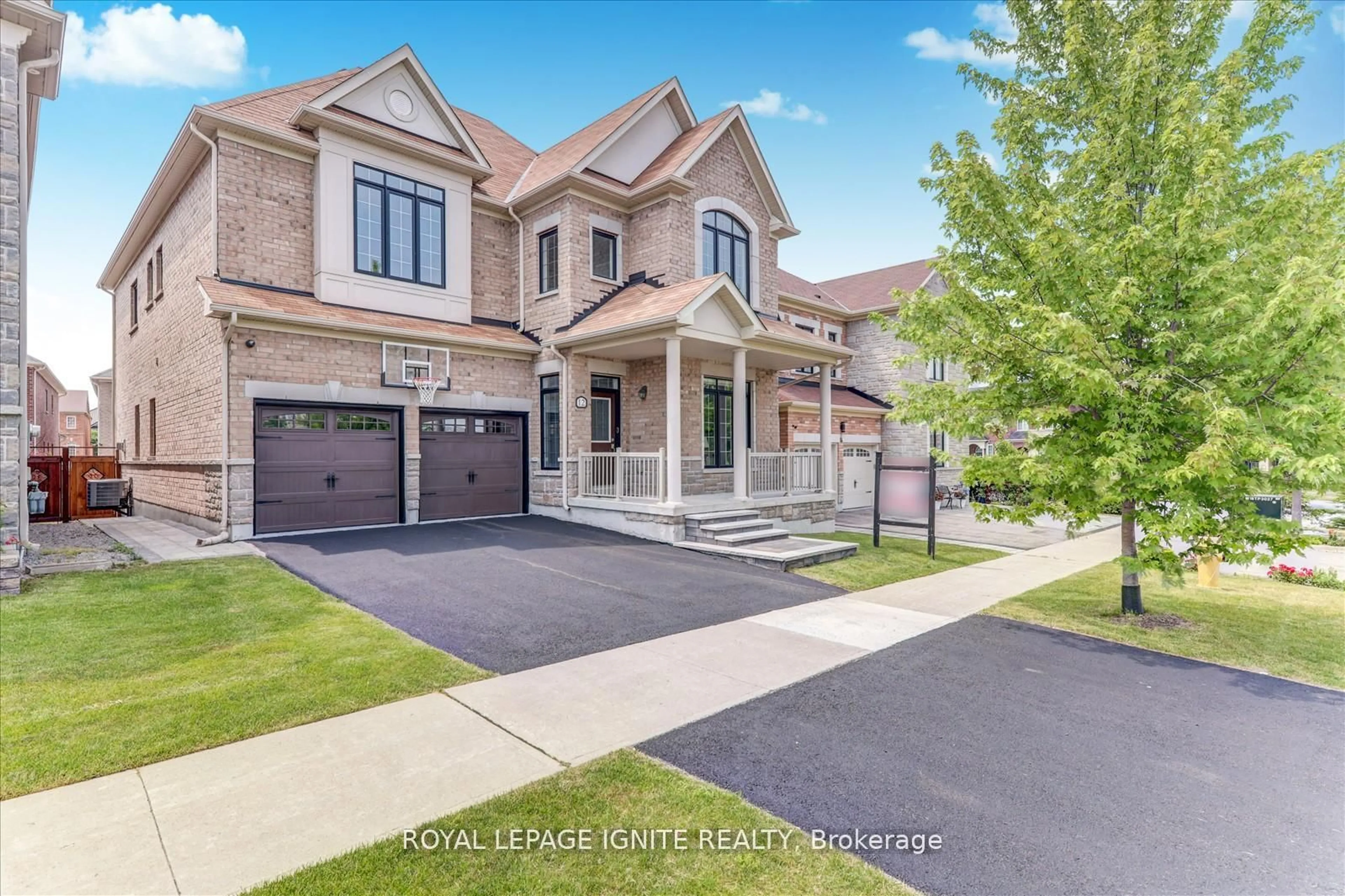Home with brick exterior material, street for 12 Warton Crt, Markham Ontario L6E 2G1