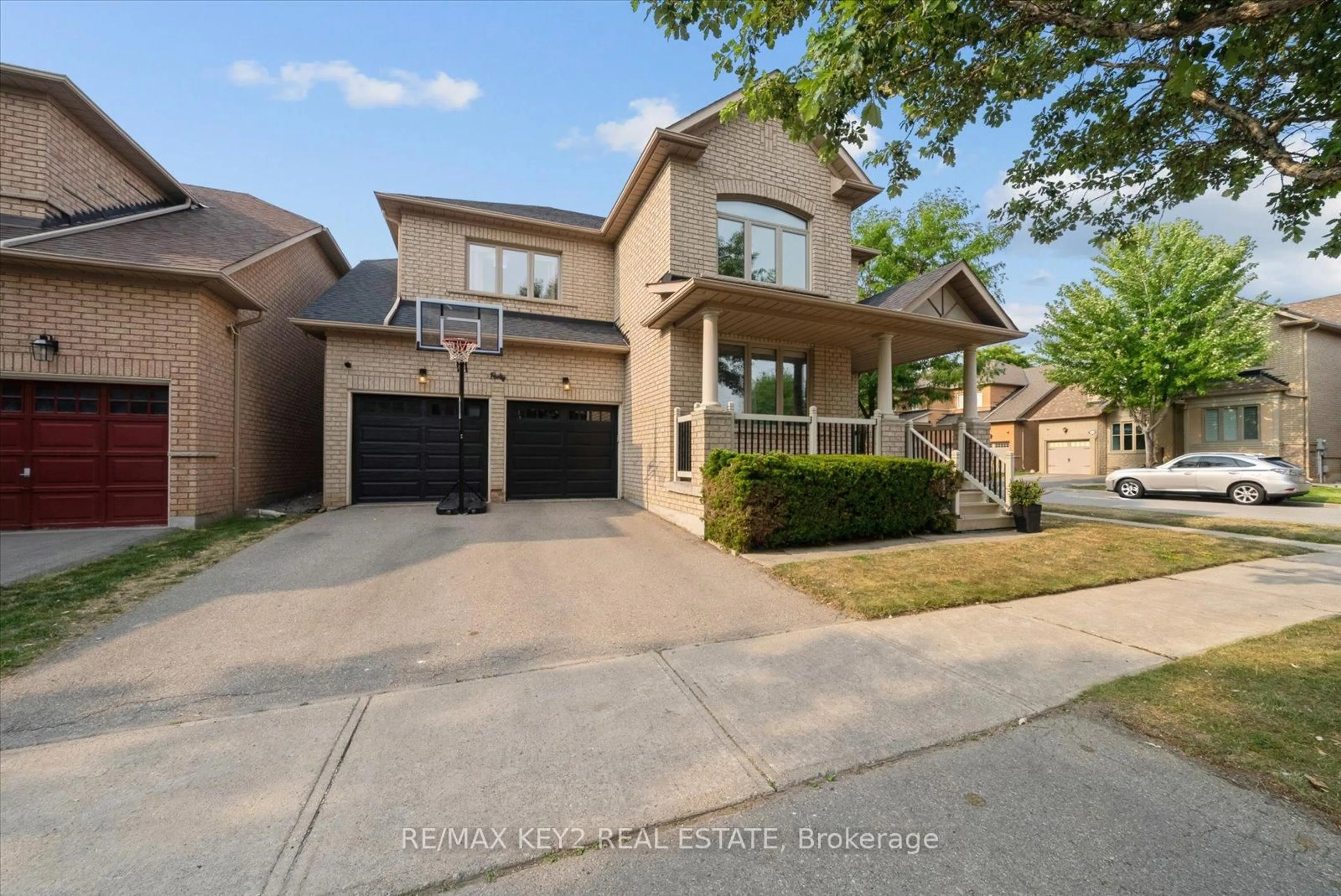 Home with brick exterior material, street for 40 Saintsbury Rd, Markham Ontario L6C 2J1