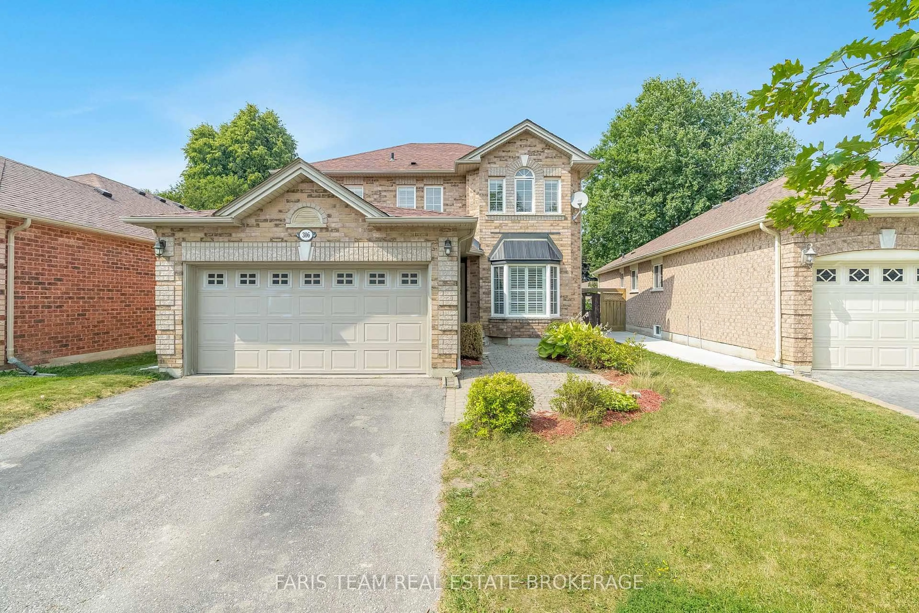 Home with brick exterior material, street for 306 Tupper Blvd, New Tecumseth Ontario L9R 1Z6