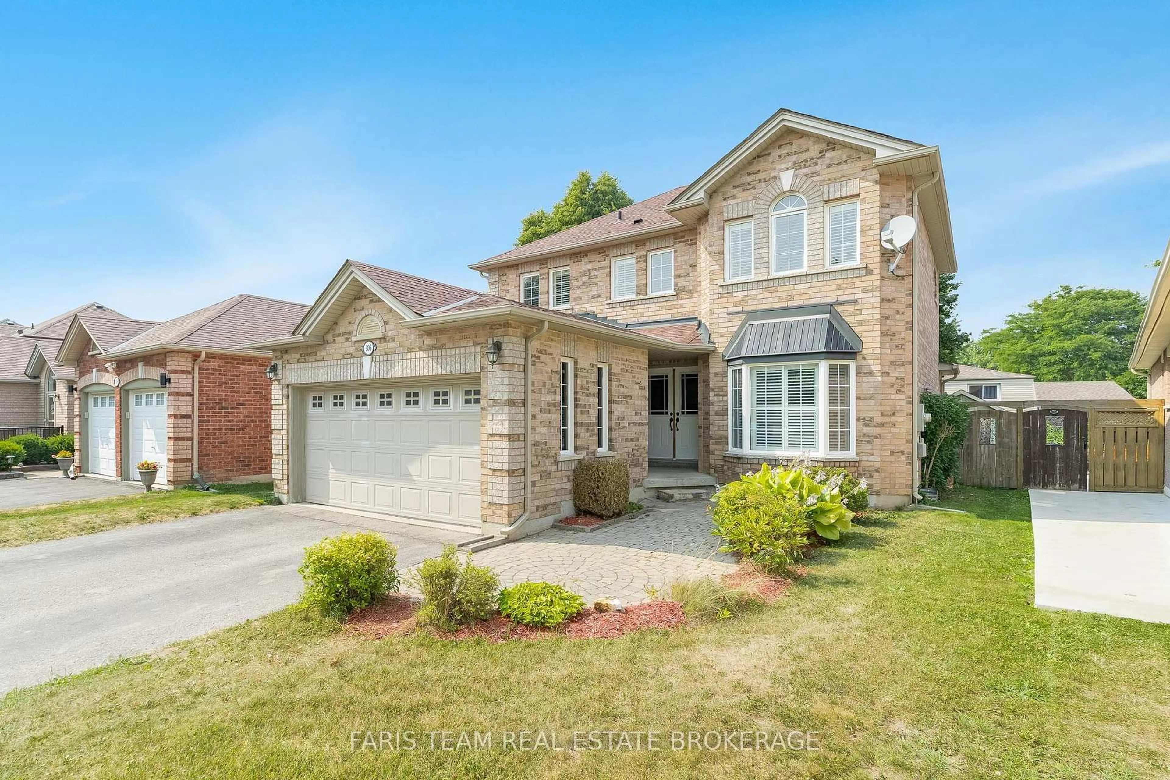 Home with brick exterior material, street for 306 Tupper Blvd, New Tecumseth Ontario L9R 1Z6