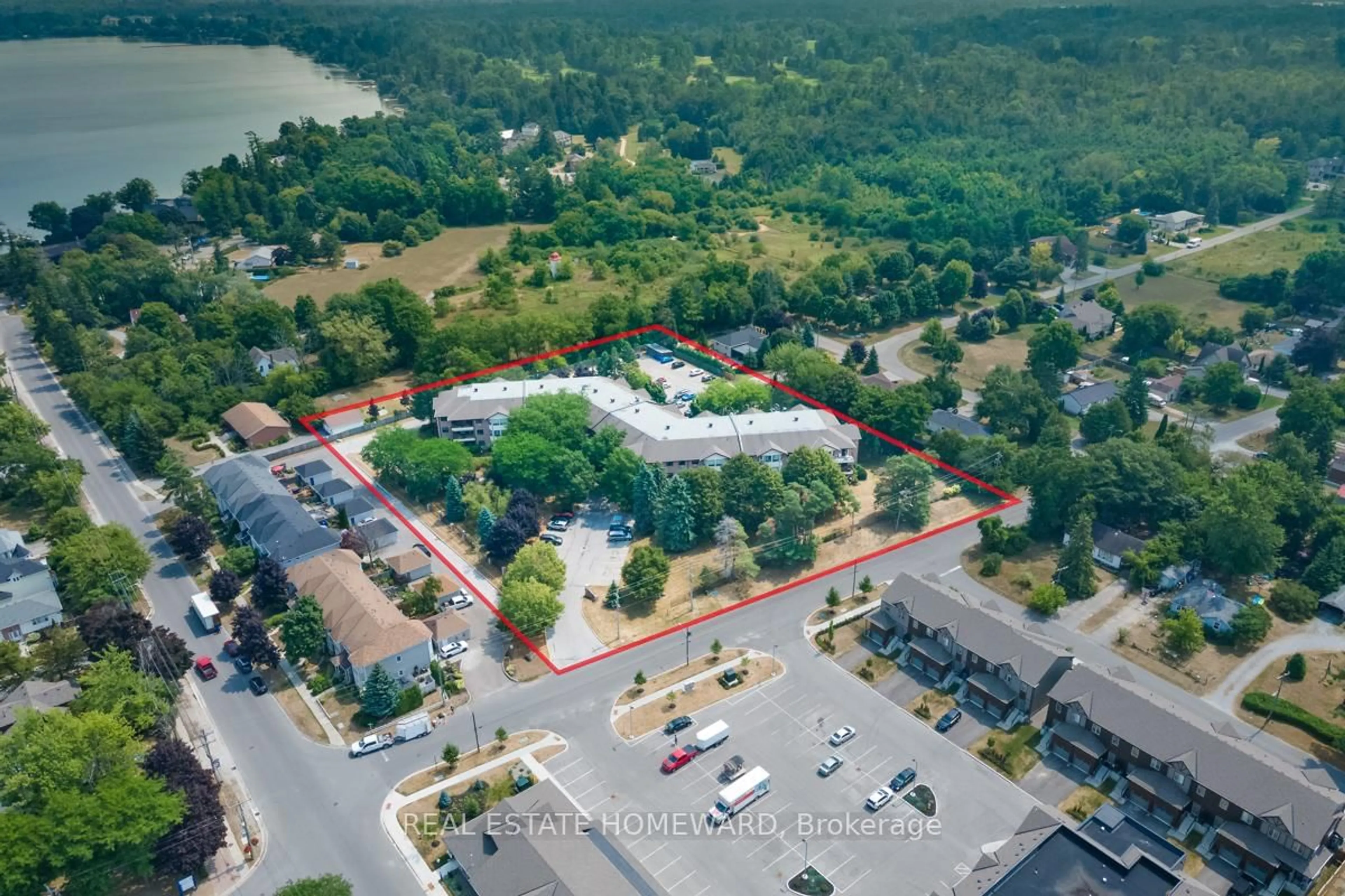 A pic from outside/outdoor area/front of a property/back of a property/a pic from drone, unknown for 111 Grew Blvd #208, Georgina Ontario L0E 1L0