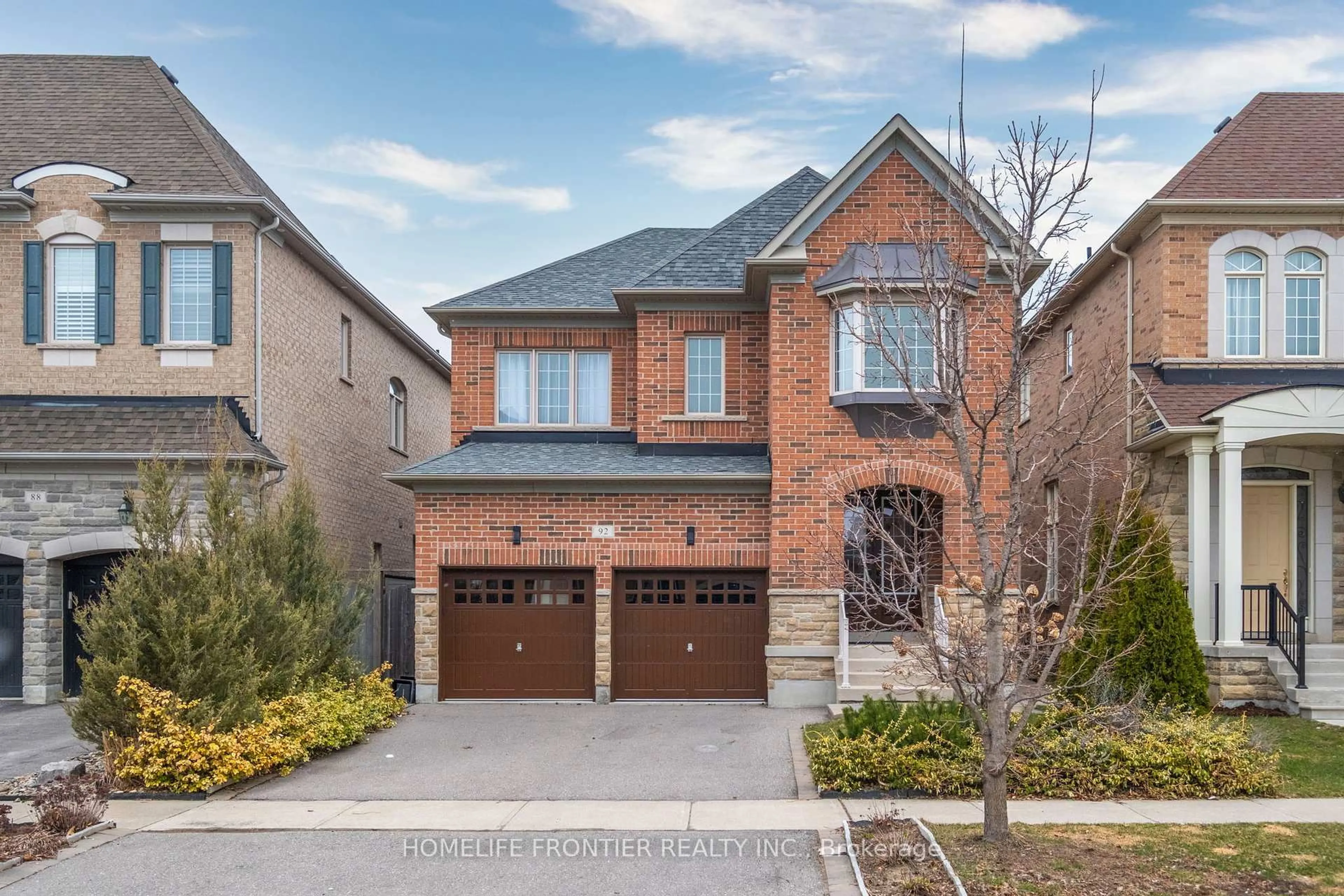 Home with brick exterior material, street for 92 Wardlaw Pl, Vaughan Ontario L4H 0Z9