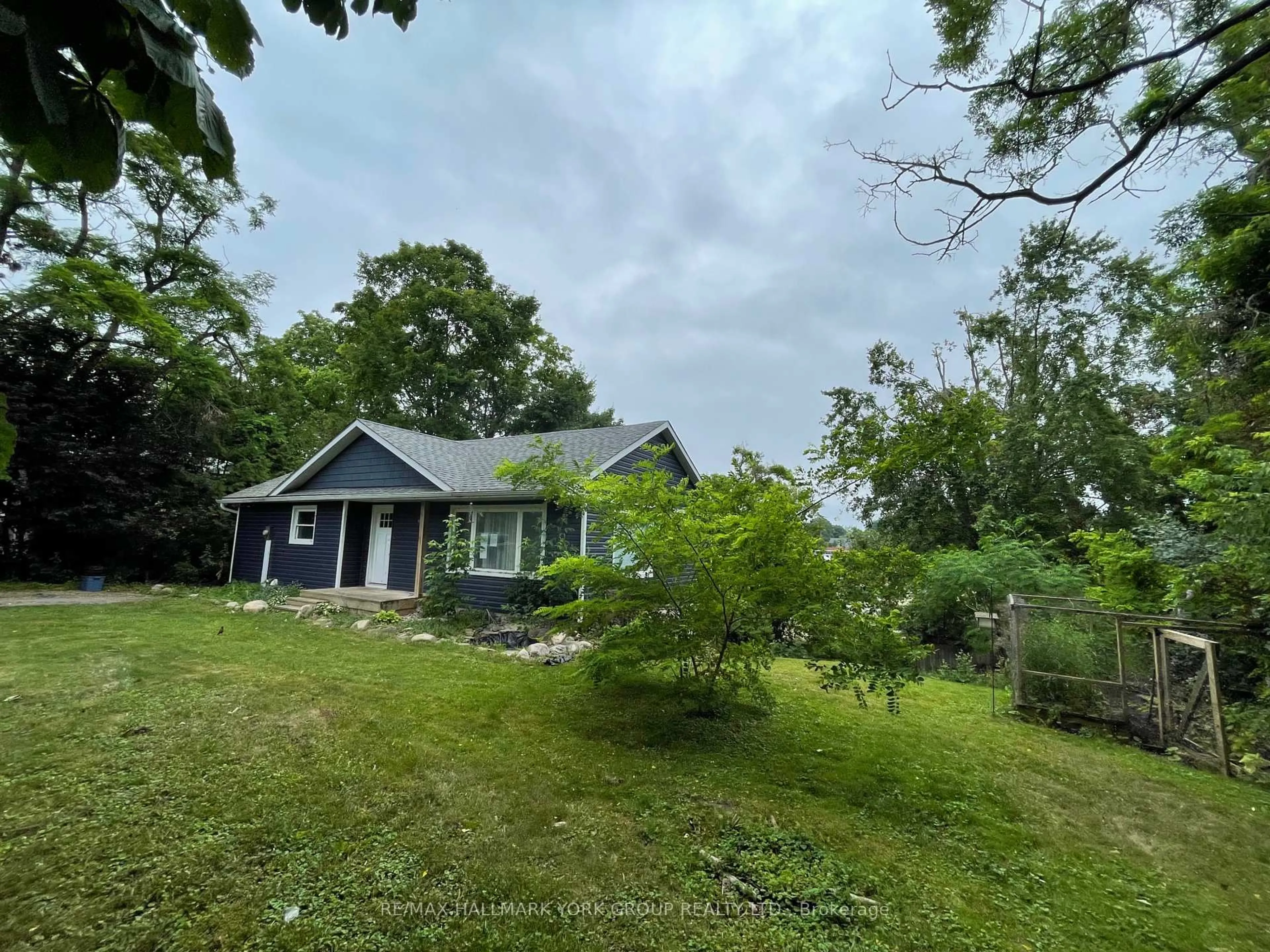 A pic from outside/outdoor area/front of a property/back of a property/a pic from drone, unknown for 19 Malone Rd, Georgina Ontario L0E 1L0