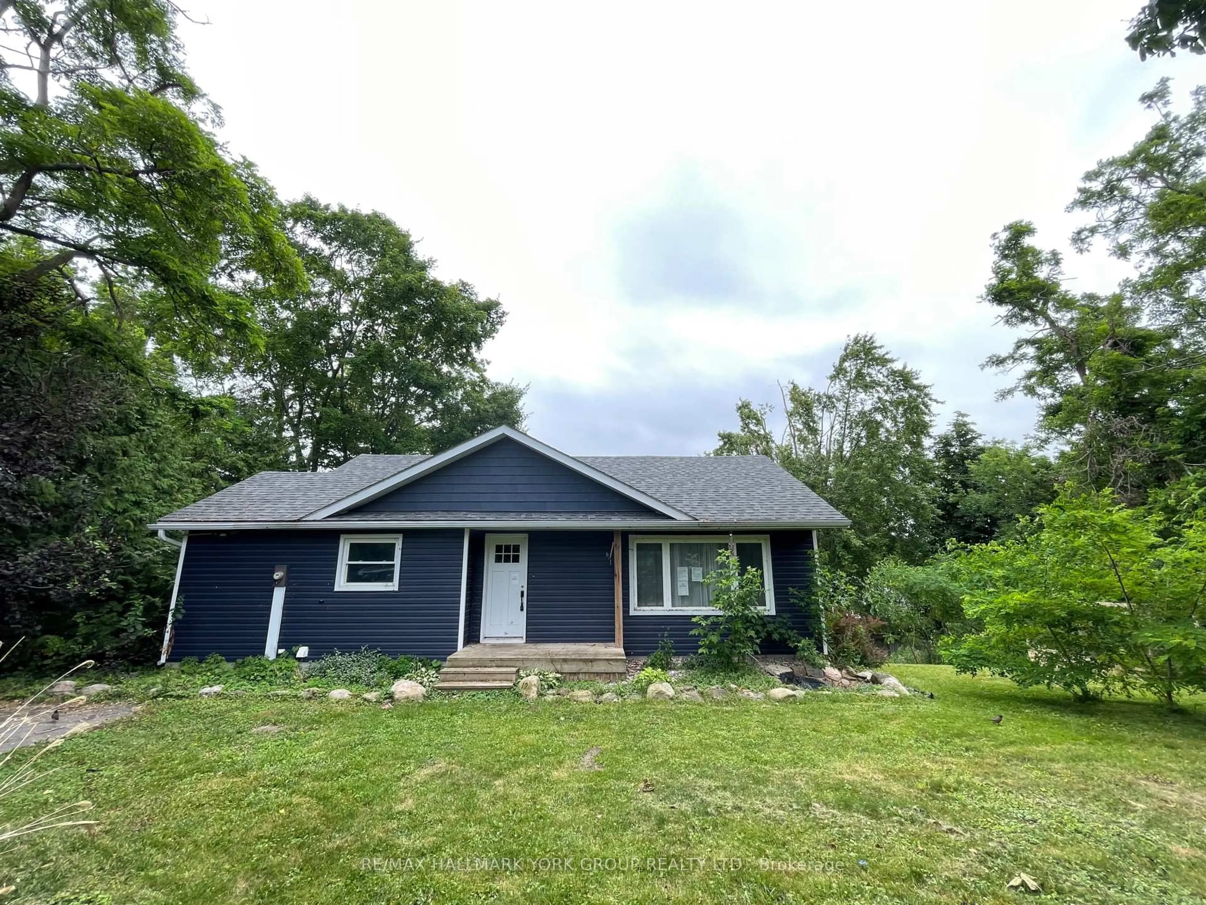 A pic from outside/outdoor area/front of a property/back of a property/a pic from drone, unknown for 19 Malone Rd, Georgina Ontario L0E 1L0