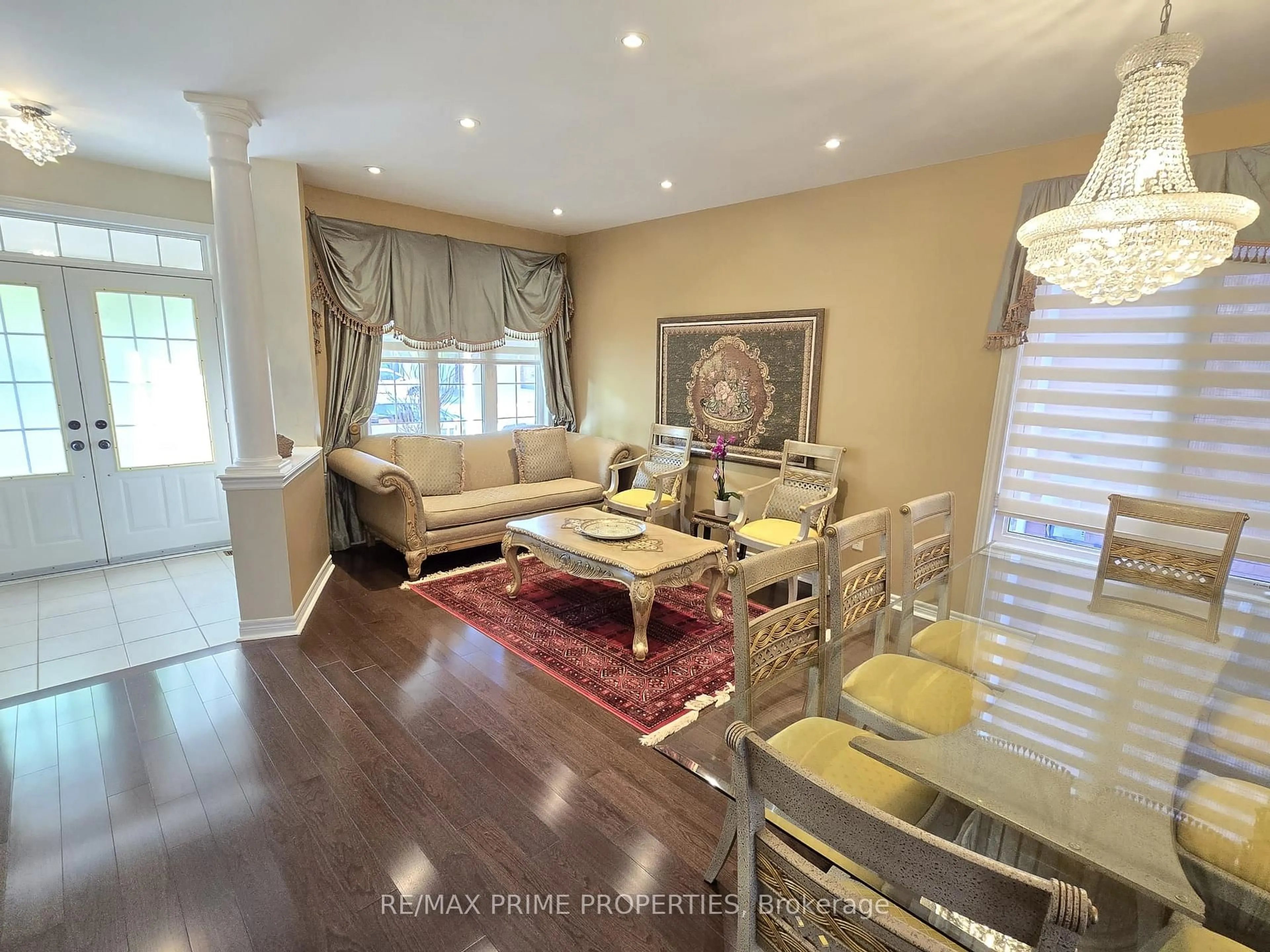 Living room with furniture, wood/laminate floor for 13 Lundy Dr, Markham Ontario L6B 0G1
